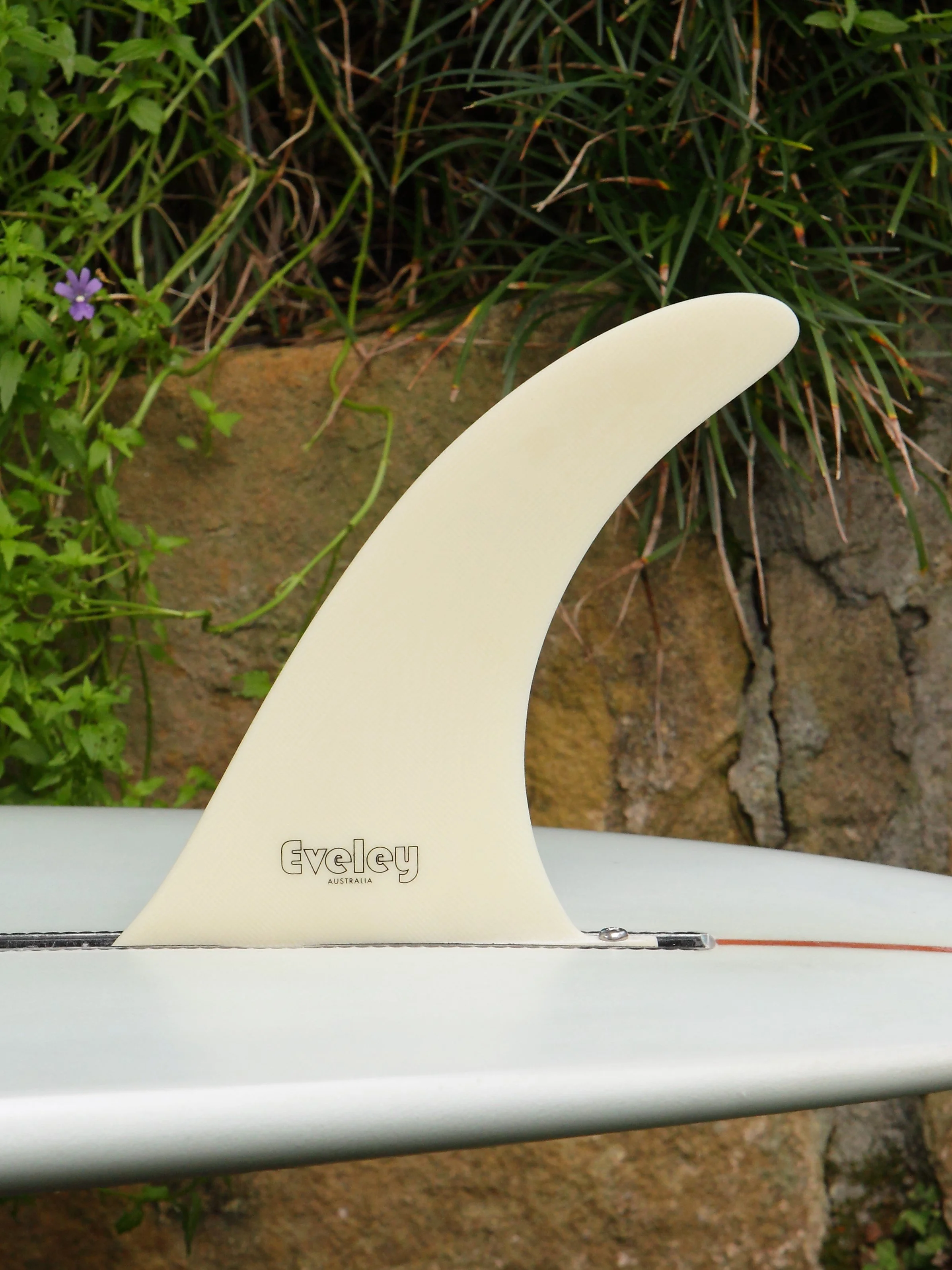 7.5" International 4A Center Fin in Bone Pro Glass.