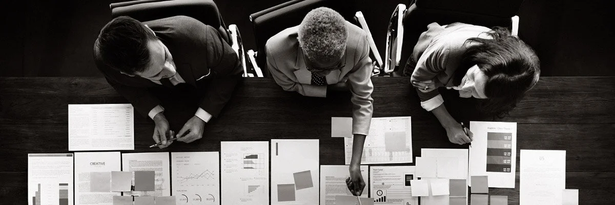 Office People Reviewing Paperwork