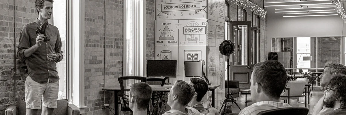 Boss Addresses Team at Meeting