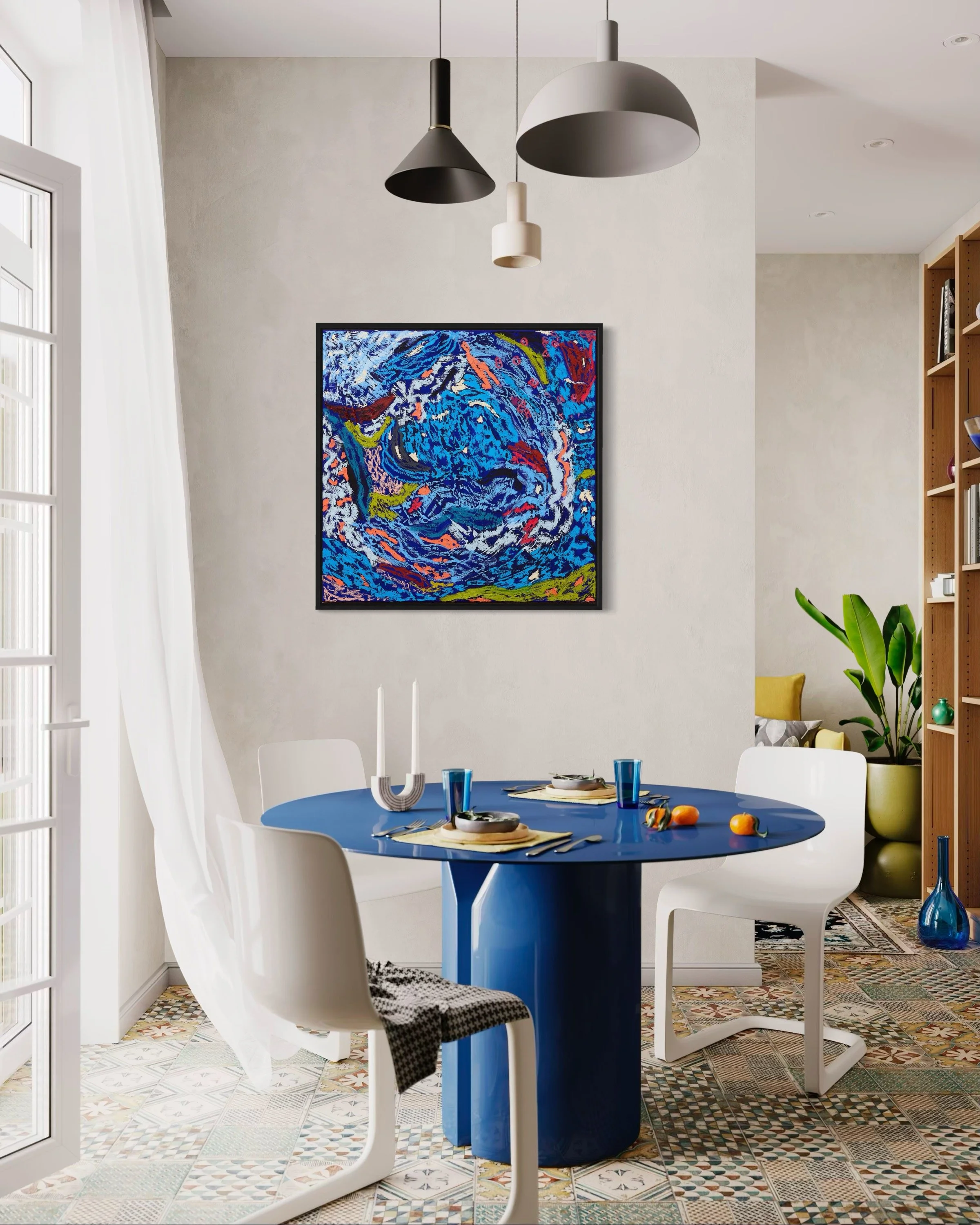 Modern dining room with a blue table, white chairs, colorful patterned floor, abstract blue and multicolored artwork on the wall, potted plant, and pendant lighting fixtures.
