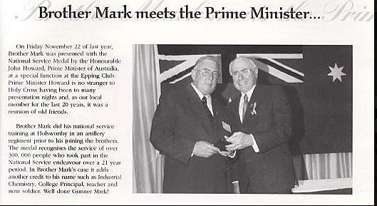 2002 - Mark (Kevin) Ryan receiving his National Service Medal from then prime Minister, John Howard at the Epping Club.