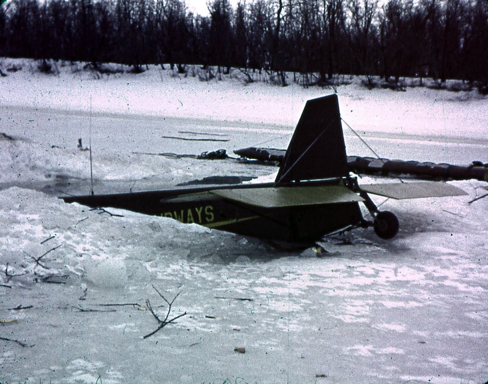  1940s Airplane through the ice at Kwethluk. Photo on loan from the Henkelman Archives. 