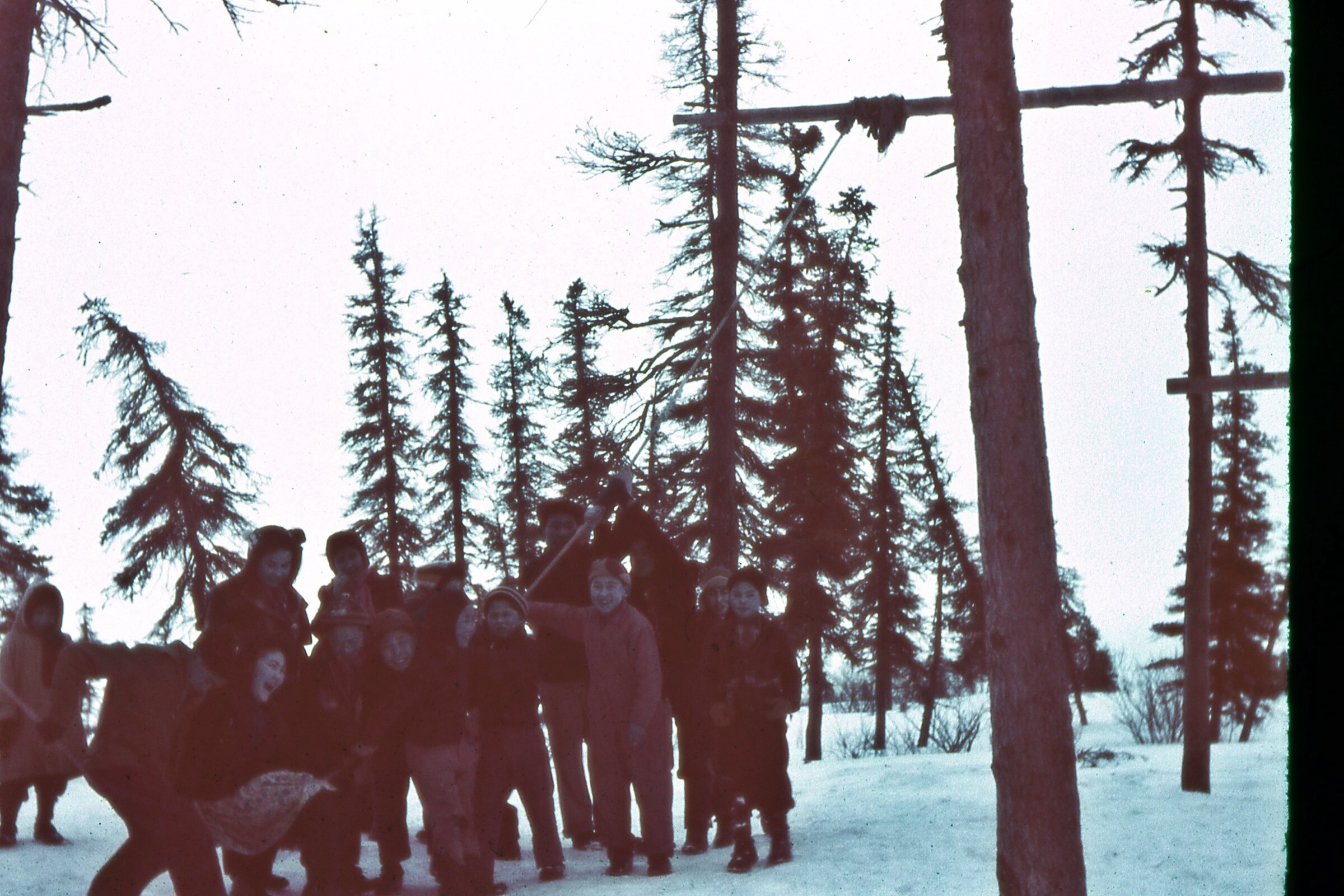  1940s Boys swinging.Photo on loan from the Henkelman Archives. 