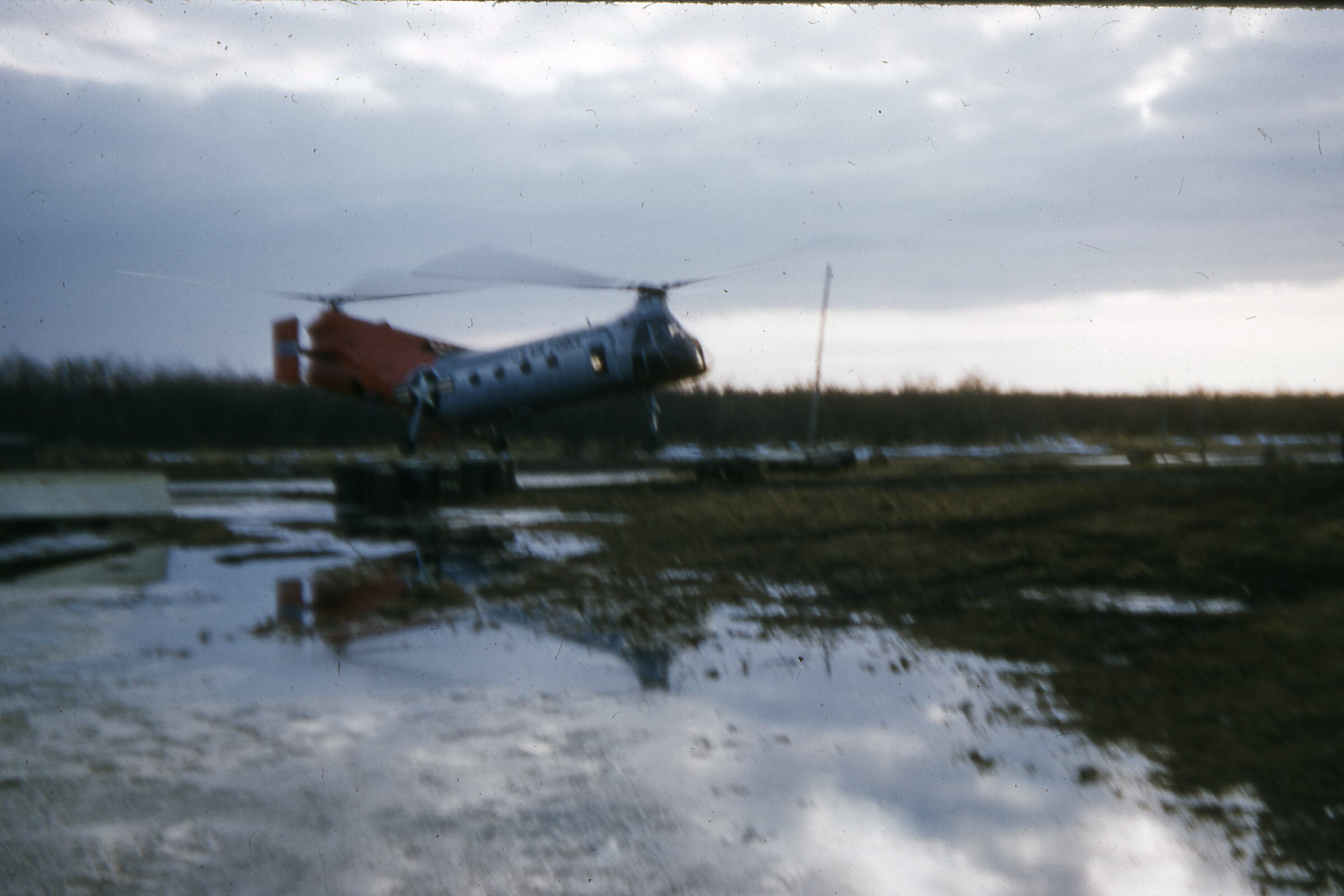 50s - Chopper during spring flood.jpg