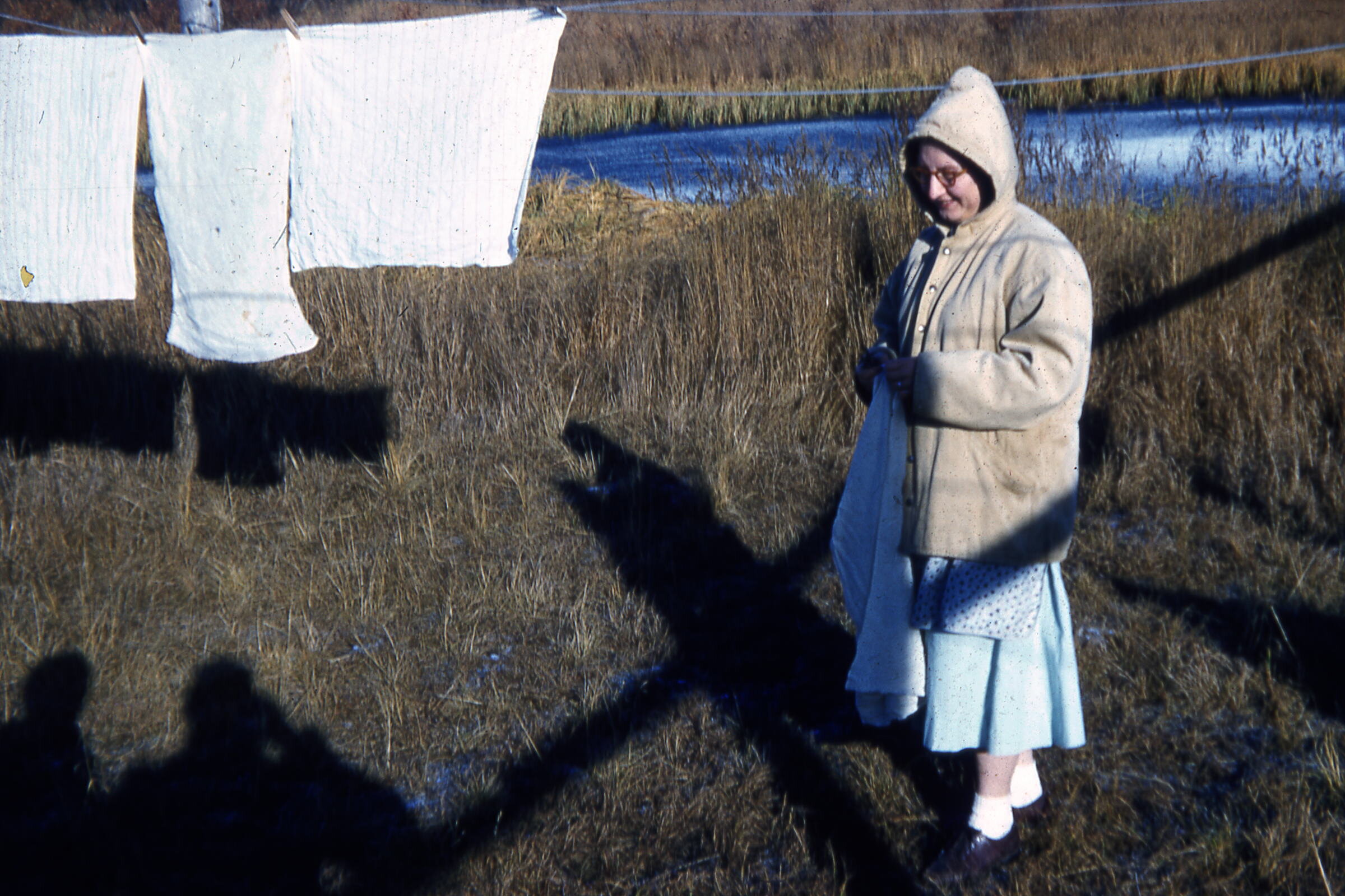50s - Clara Cooper hanging laundry.jpg