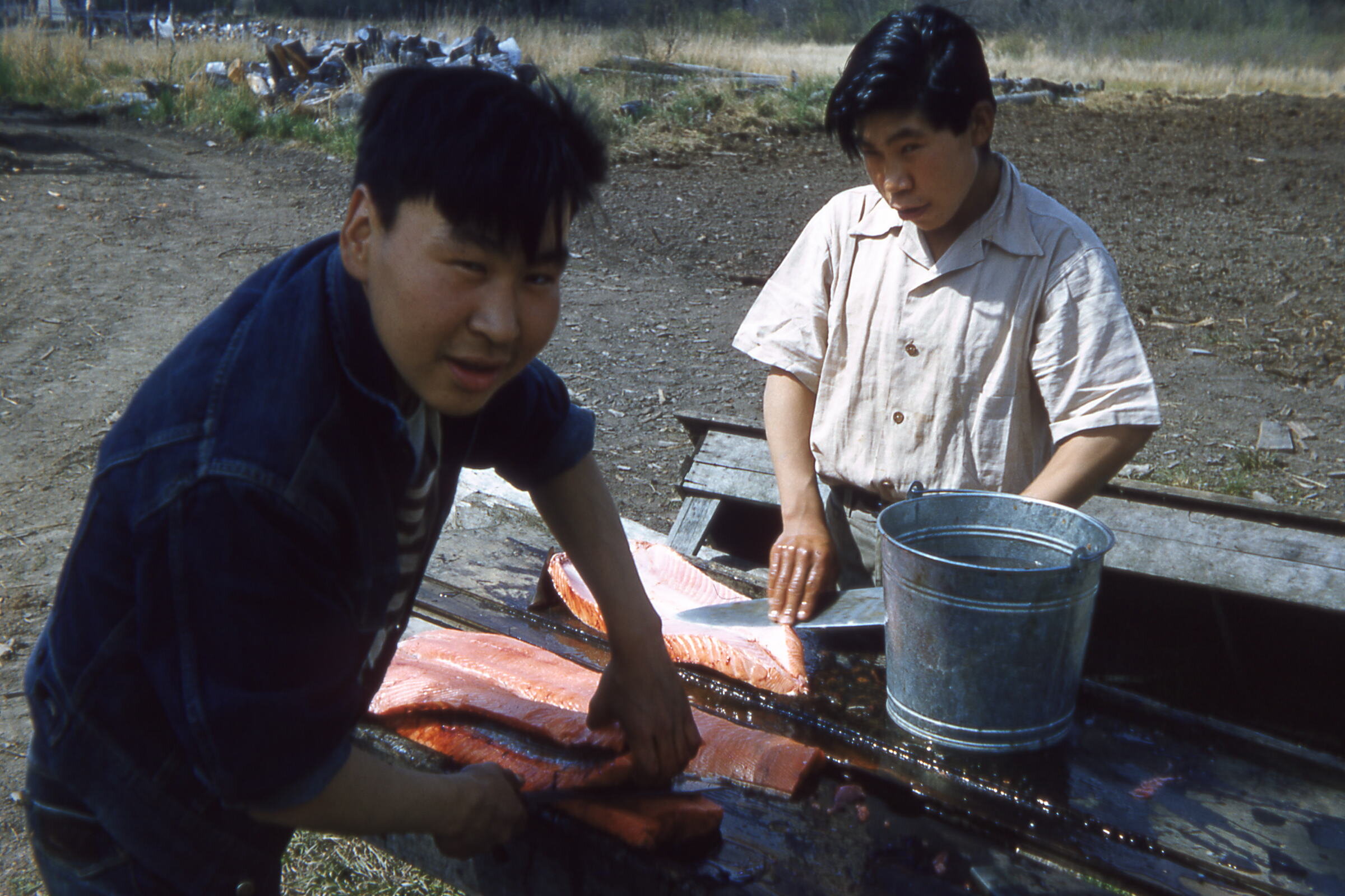 50s - Robert and Andrew cleaning fish.jpg