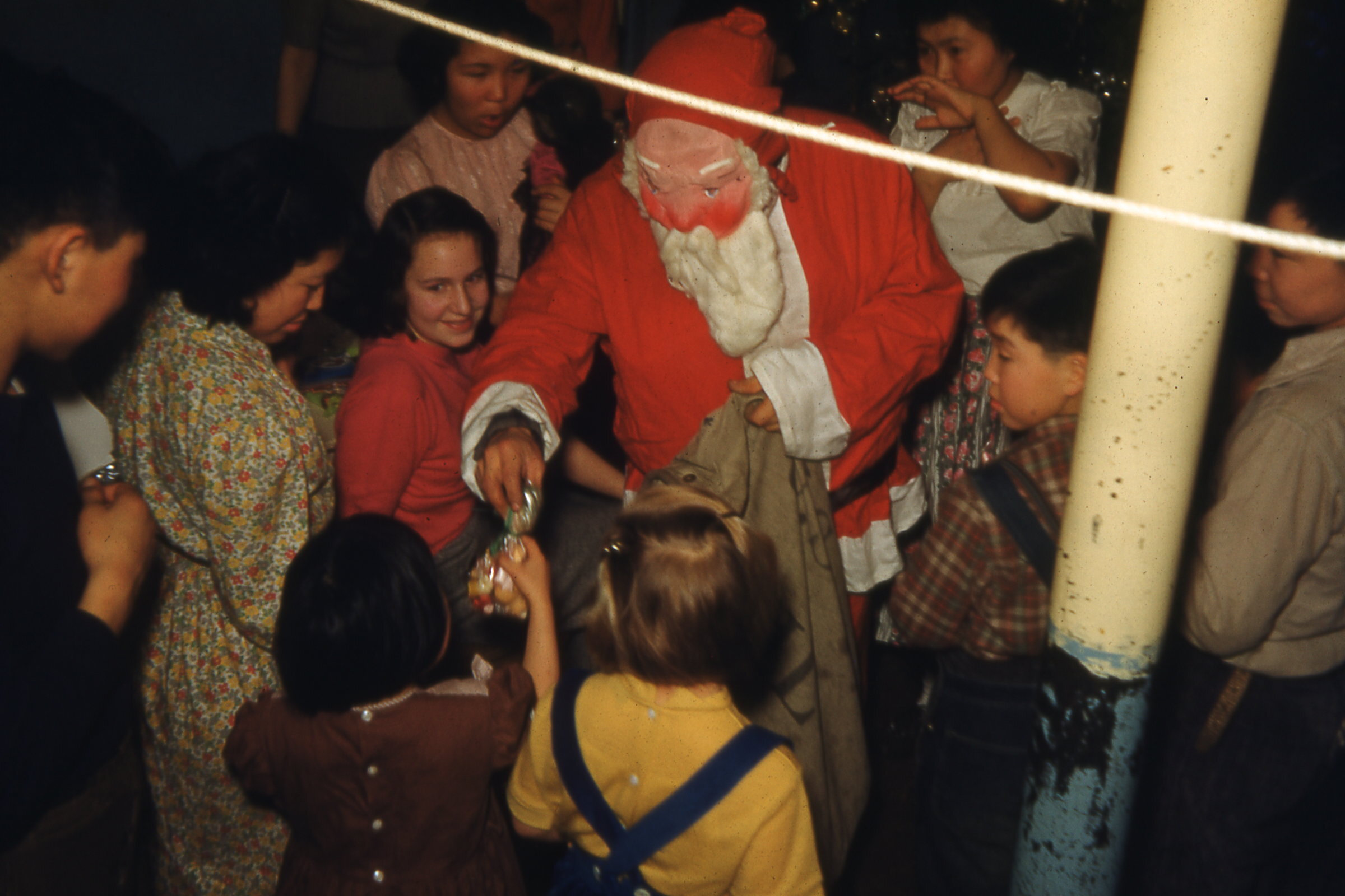 50s - Santa handing out gifts.jpg