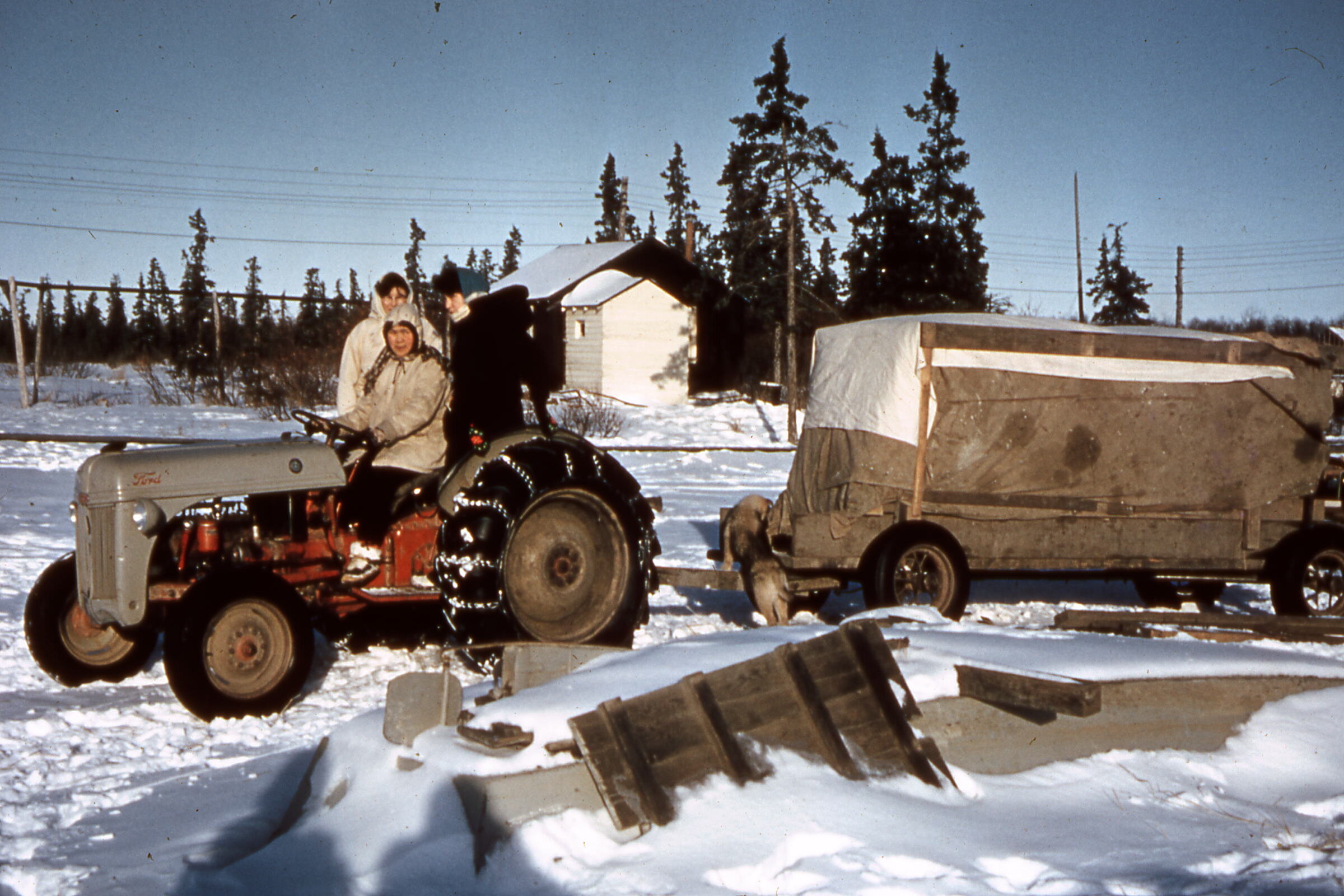 50s - Tractor leaving for Bethel with the Wagon.jpg