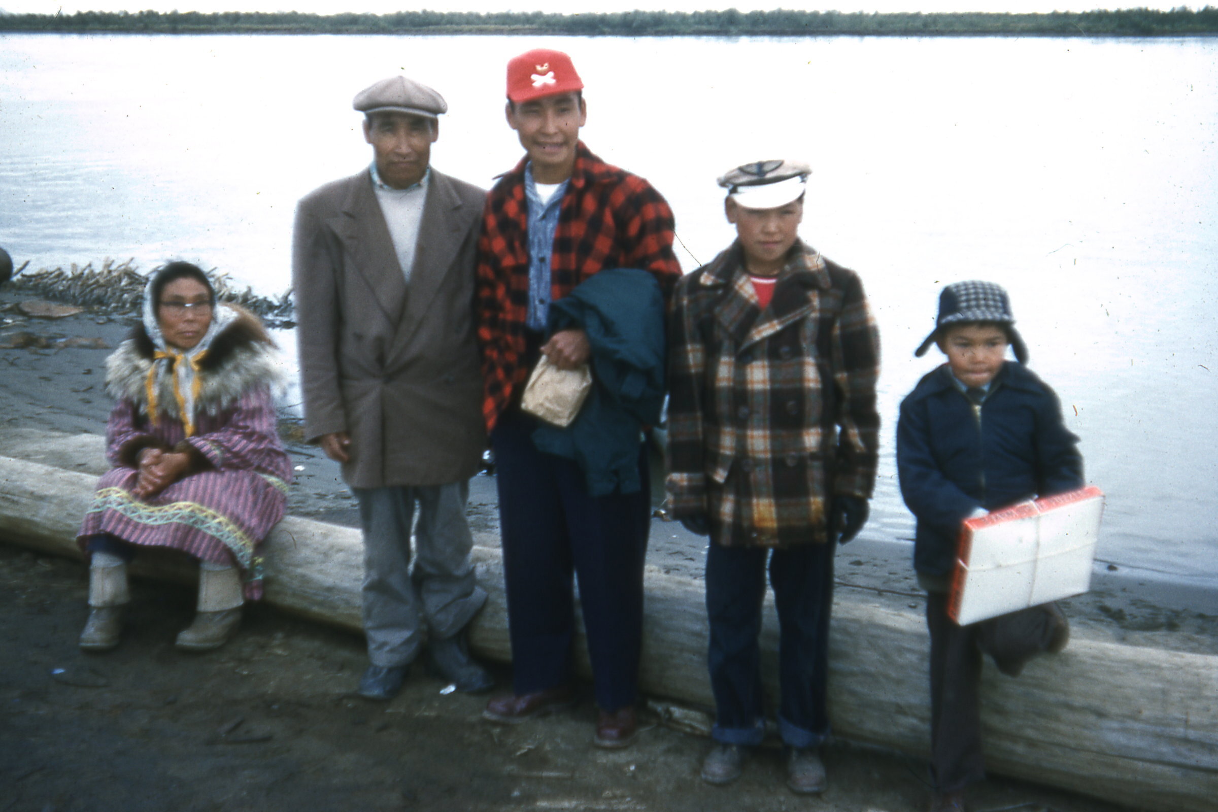 195x - Family along river bank.jpg
