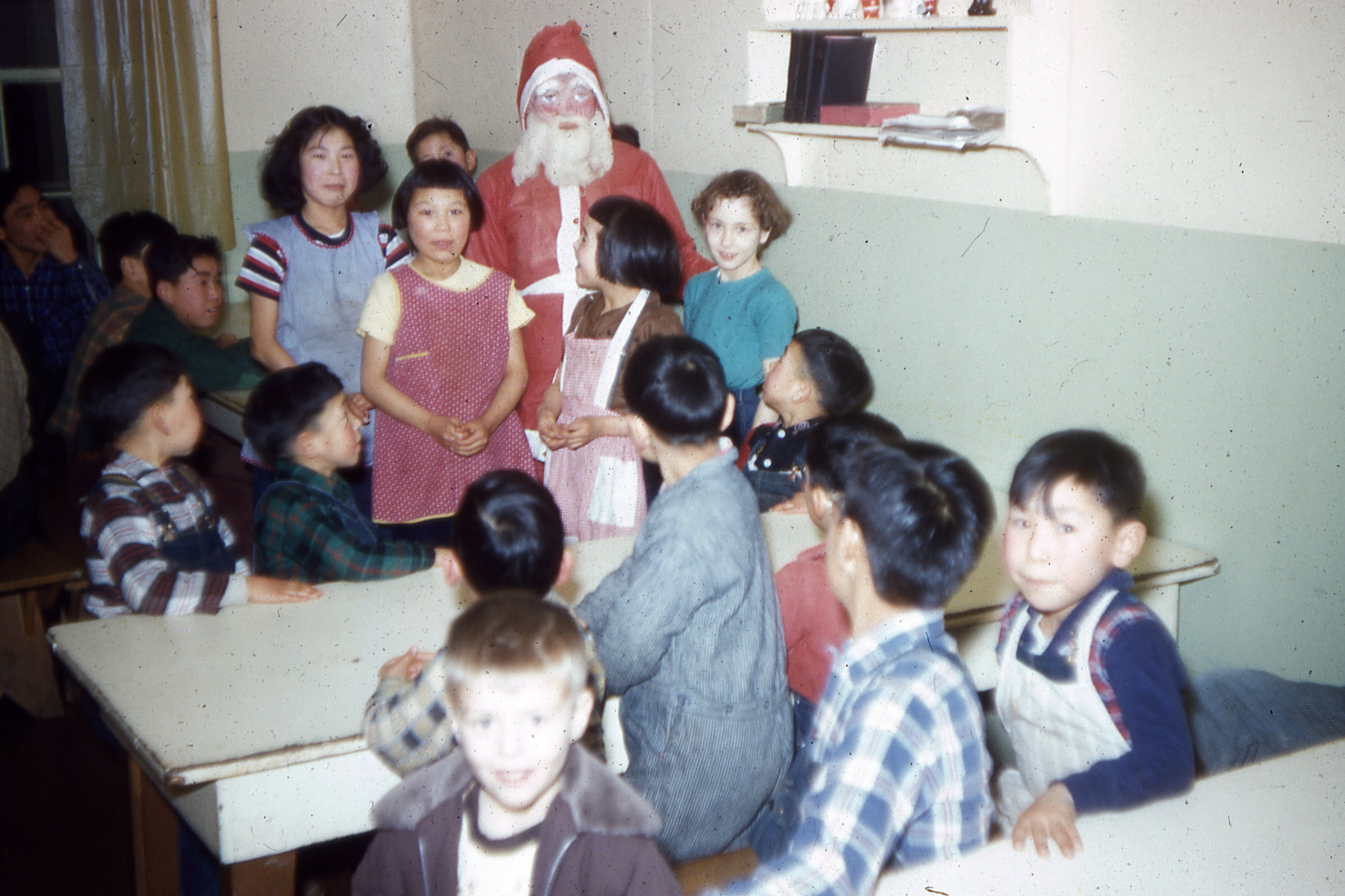  1955 Santa with children.Photo on loan from the Henkelman Archives. 