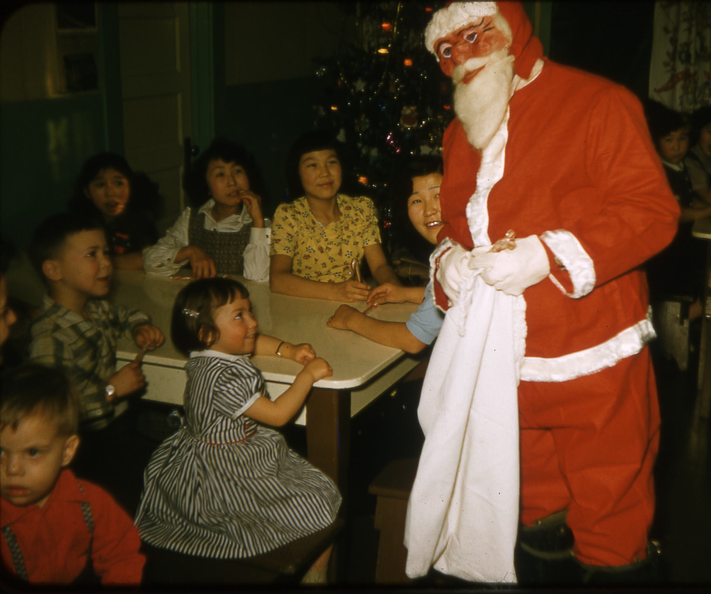  1957 Cindy and Santa. Photo on loan from the Henkelman Archives. 