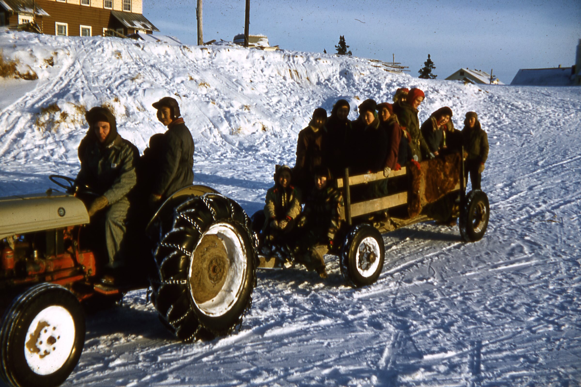 1958 Heading out with tractor and Don Schmidt.jpg