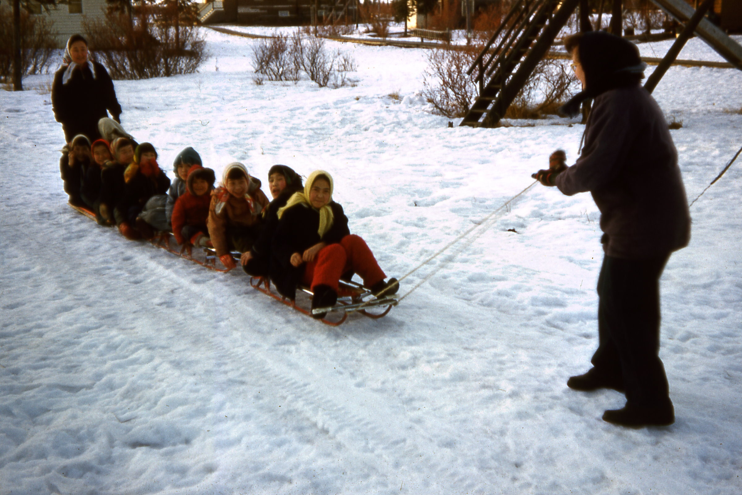 1960 Fran and girls on sled.jpg