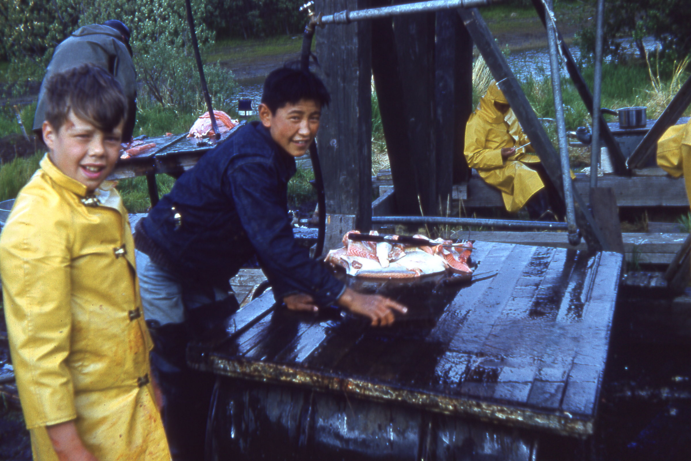 1960 Mike Williams and Joel cleaning fish.jpg