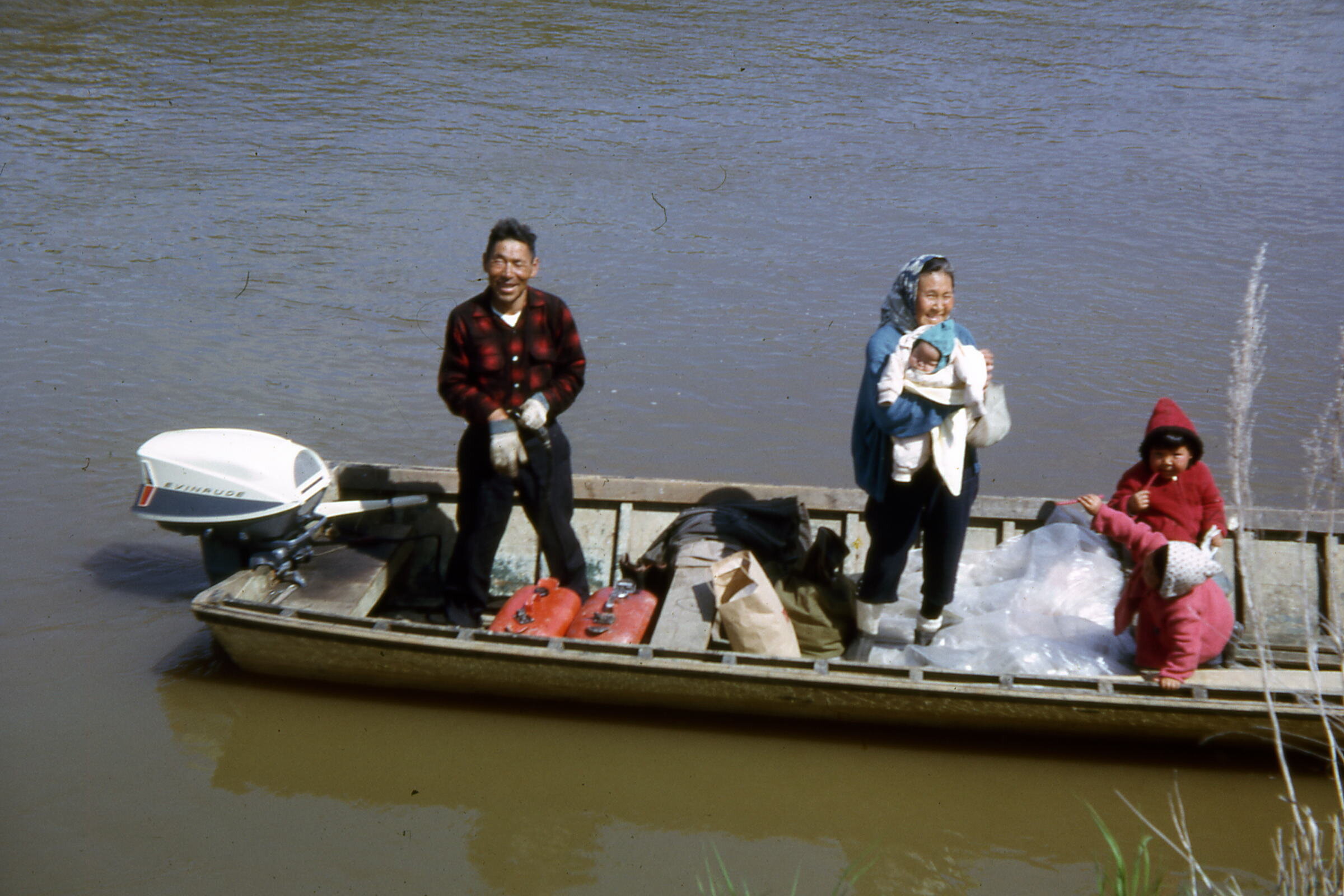 1963 Family leaving by boat.jpg