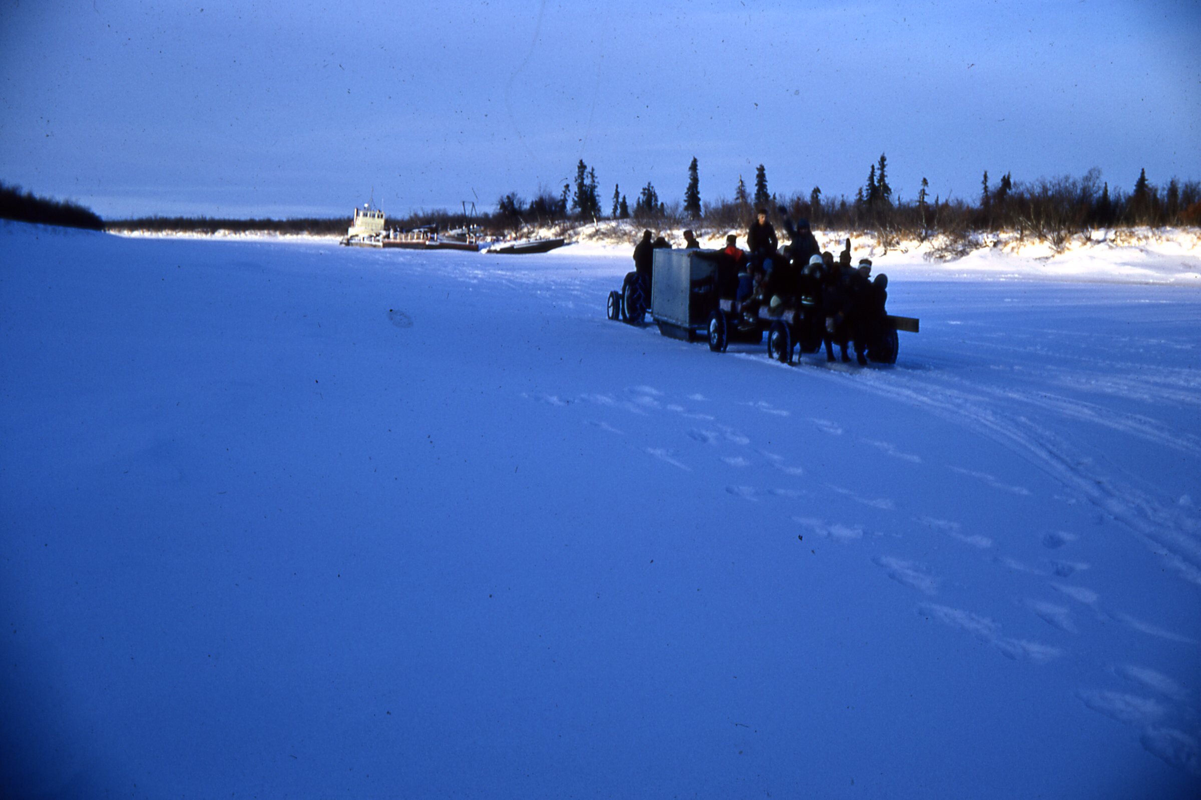 1967 Heading down river with tractor caravan.jpg