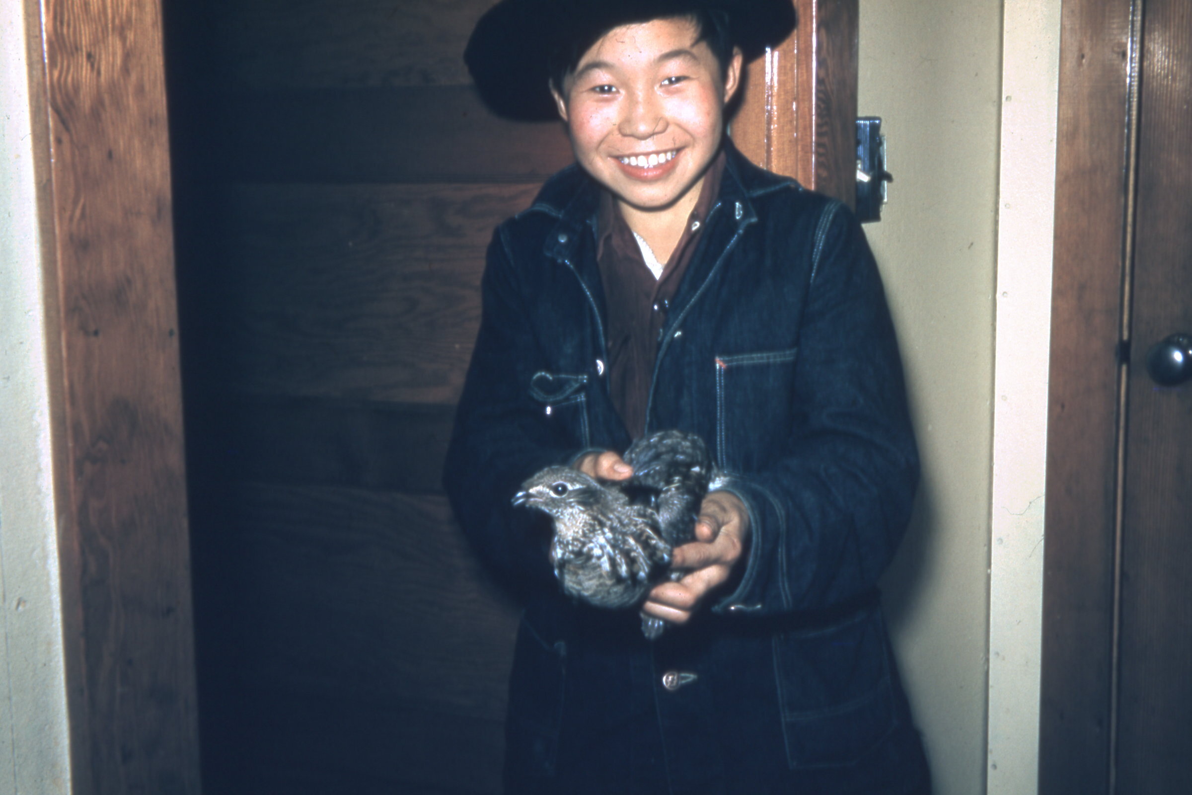 1968 boy and spruce hen.jpg