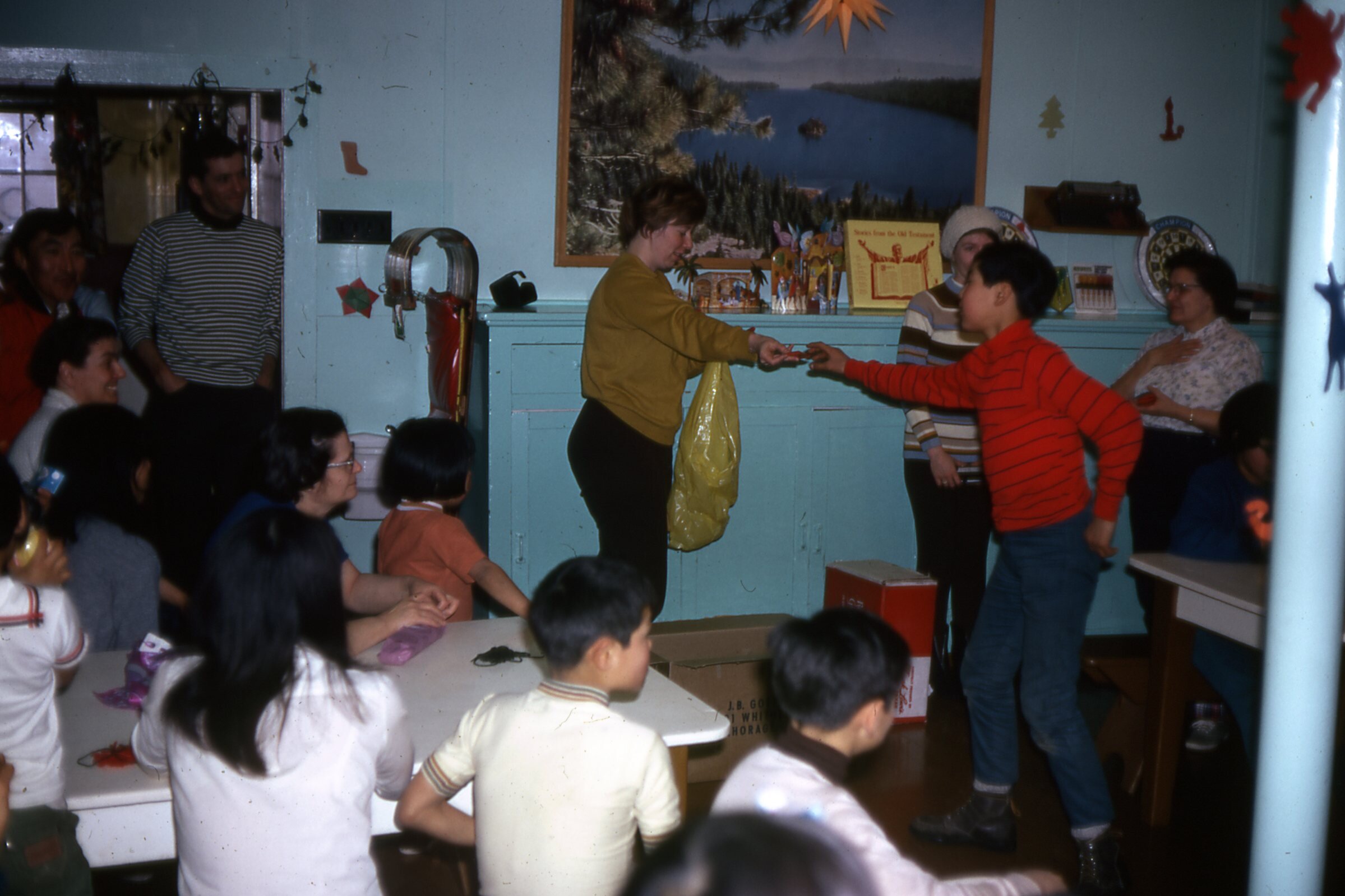 1971 Handing out Christmas gifts.jpg