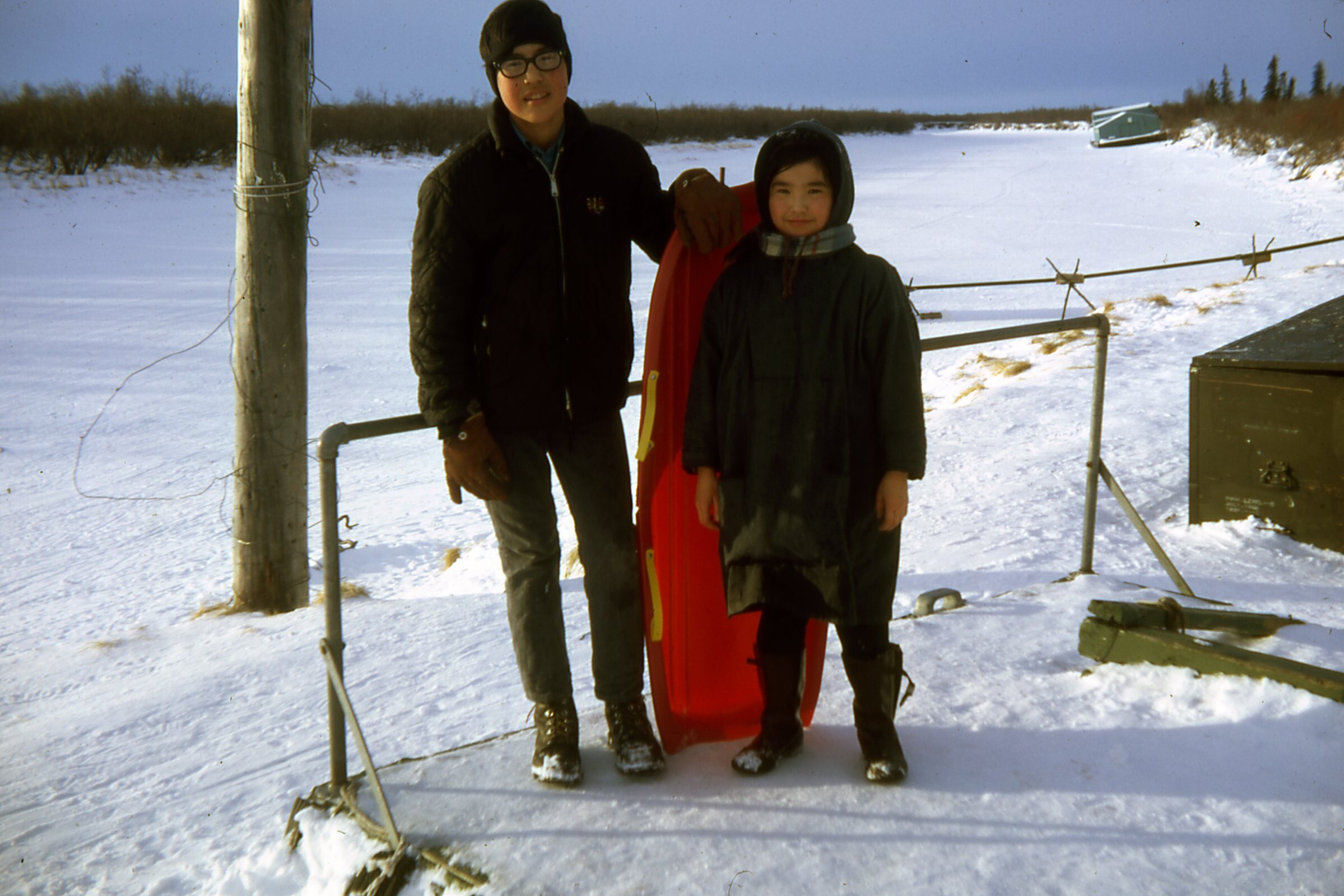 1971 Winter sleding on dock.jpg