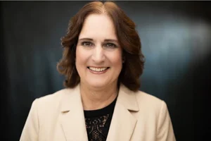 Sue McArthur, headshot by Ymaphoto