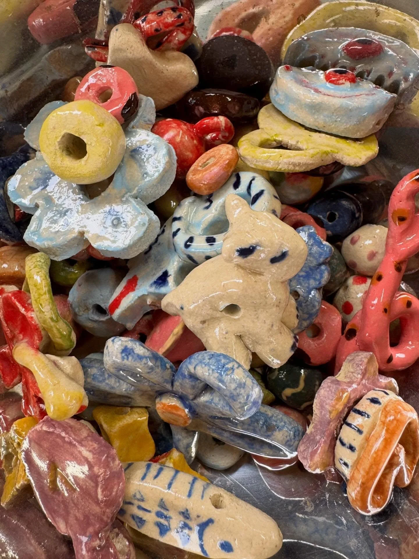 Our first batch of ceramic beads are out of the kiln. Now to string them up!
There are still spots available for our clay necklace holiday workshop Wednesday and next Monday. 
Link in bio!