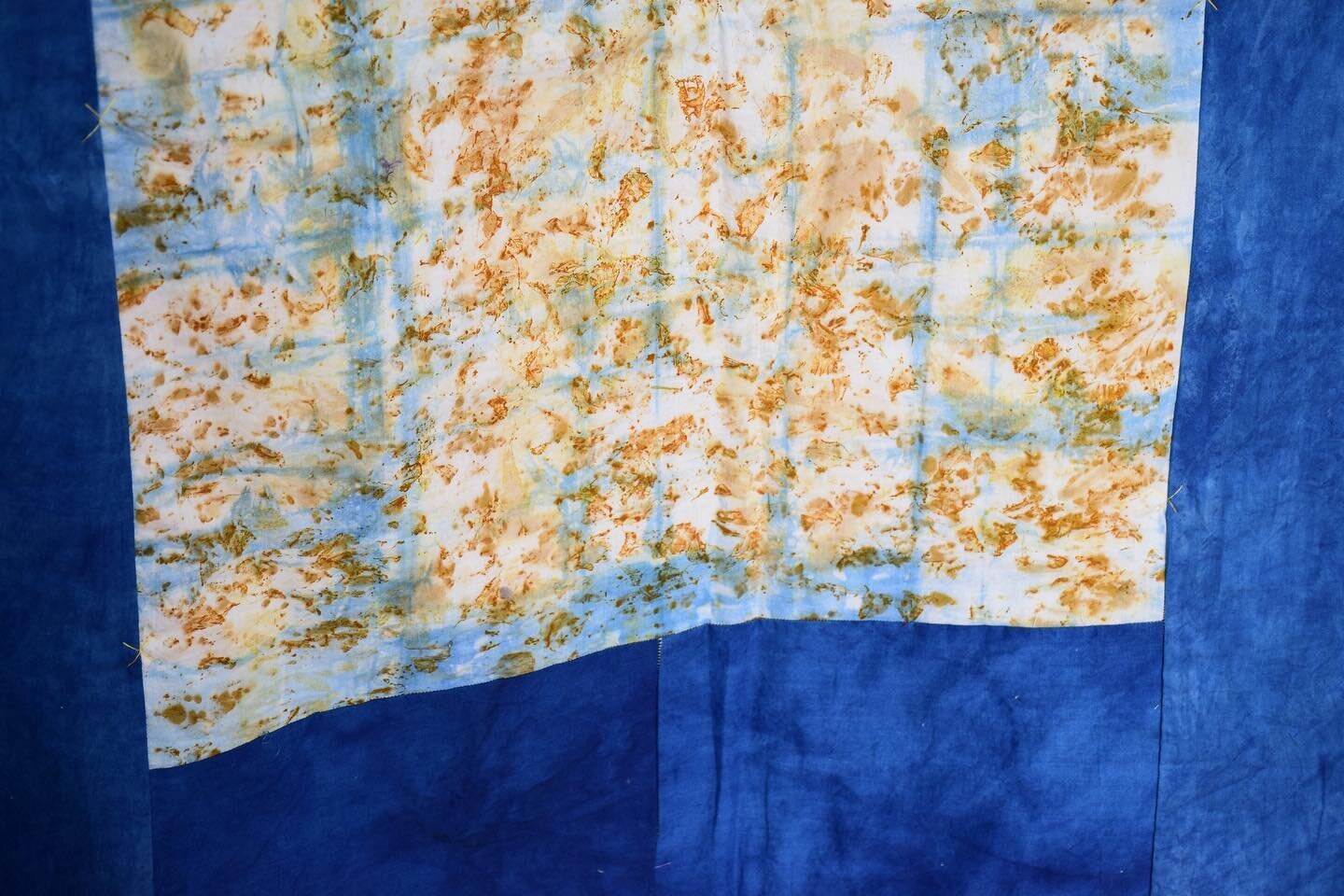 Indigo! I loved working with the beautiful deep blues that came from this dye! Here is a detail and some in progress shots from the back of the quilt. The center square was eco-printed with marigold petals and then over dyed in indigo using the itaji