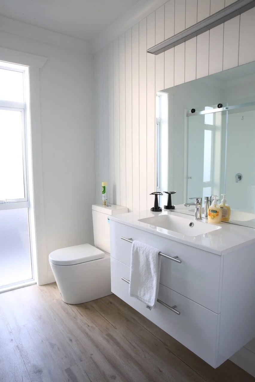 Bathroom renovation with timber floors and floating vanity unity in Taranaki New Plymouth