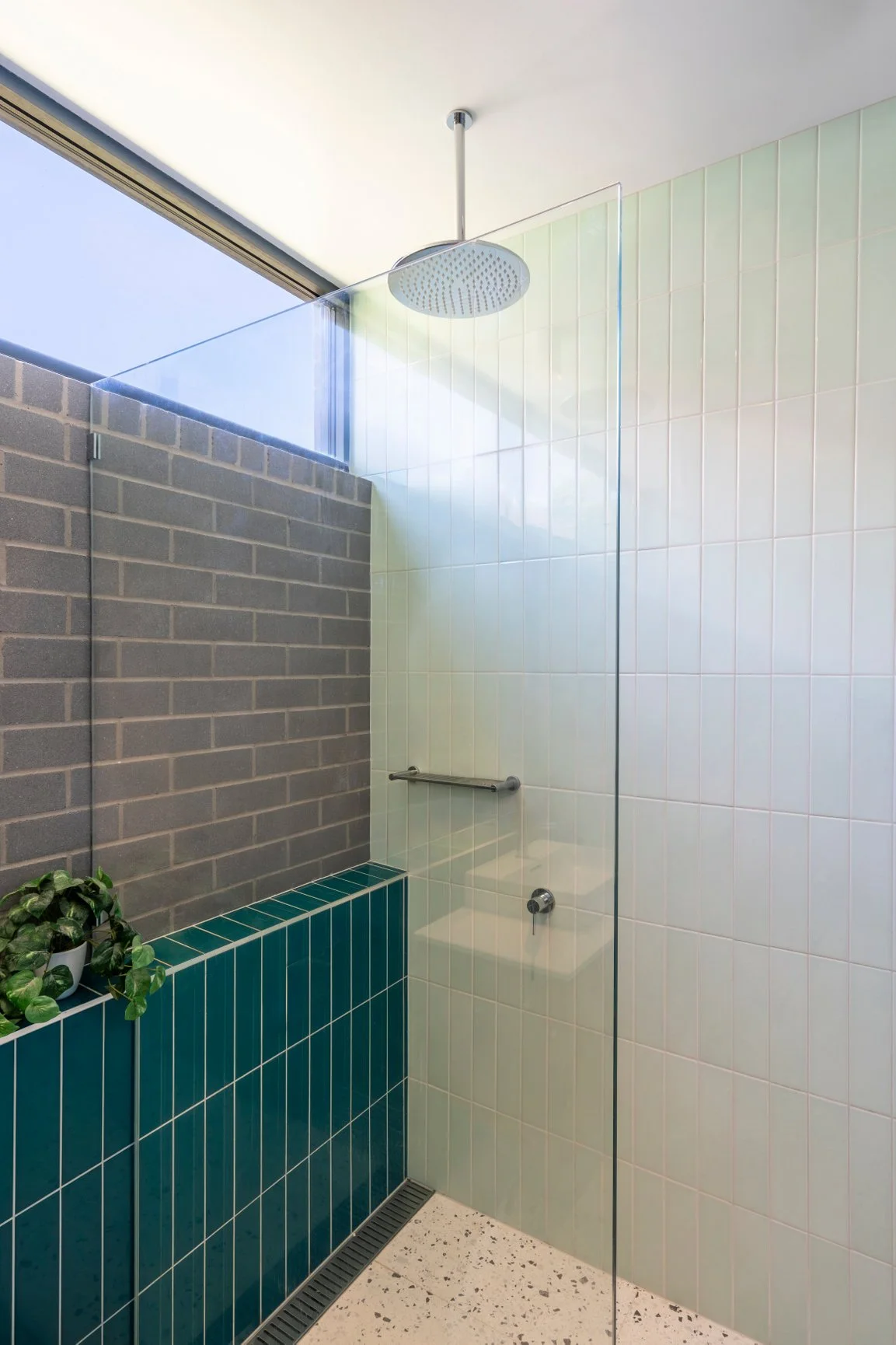 bathroom, teal tiles, aqua tiles, mint green tiles, bricks, highlight window, terrazzo, indoor pot plants