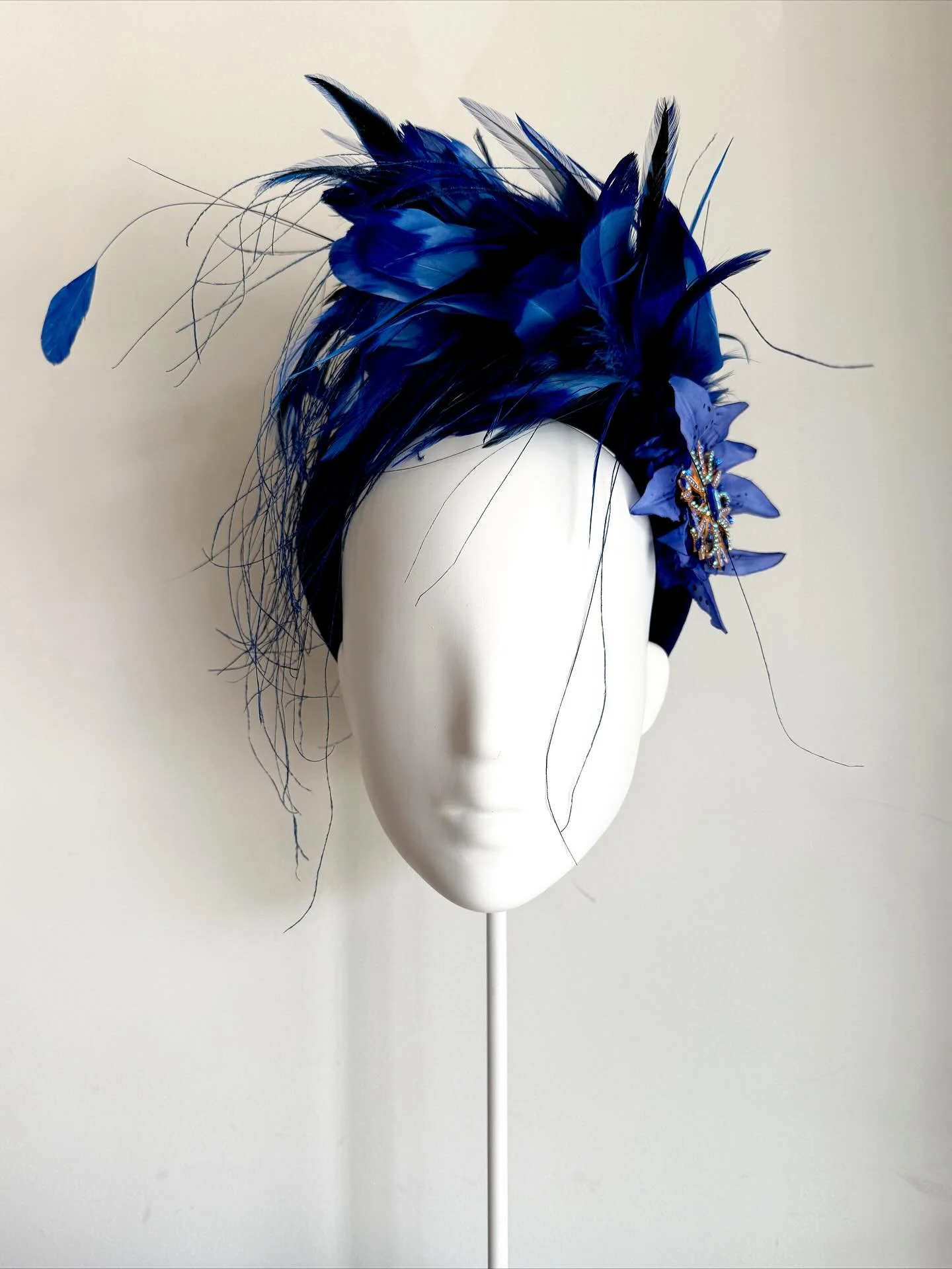 Those Blues Hues&hellip;&hellip;&hellip;&hellip;&hellip;&hellip; Introducing our latest feather piece, explosion of variety of blue feathers, set on a dark blue velvet band, finished of with delicate crystal brooch &amp; hand painted florals&hellip;&