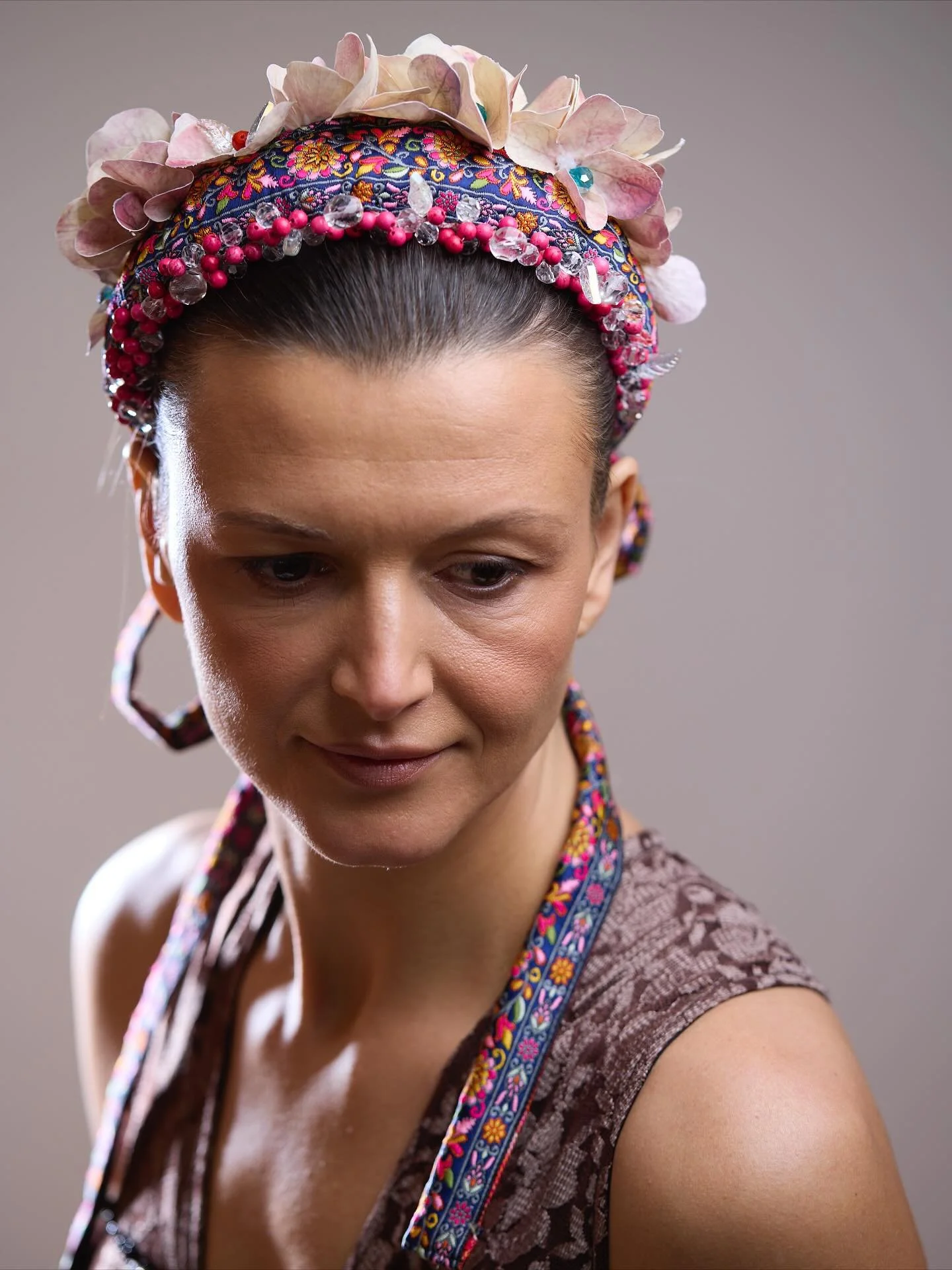 Inspired by the tales, folklore &amp; traditions of Ukraine, our beaded ribbon band, decorated with hand dyed petals, beads &amp; crystals, perfect representation of all 3 above. 
Can be worn few different ways to add some fun to your look. 
Now avai