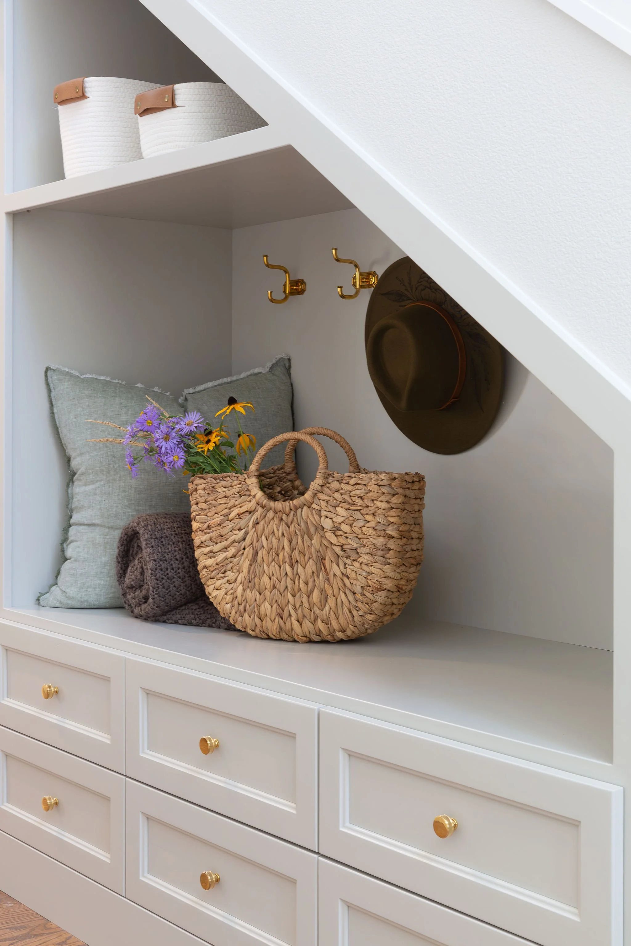 Maximize storage under stairs.jpg