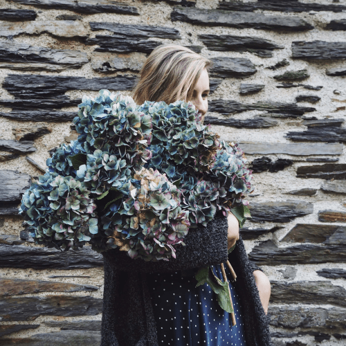 woman-with-flowers.png