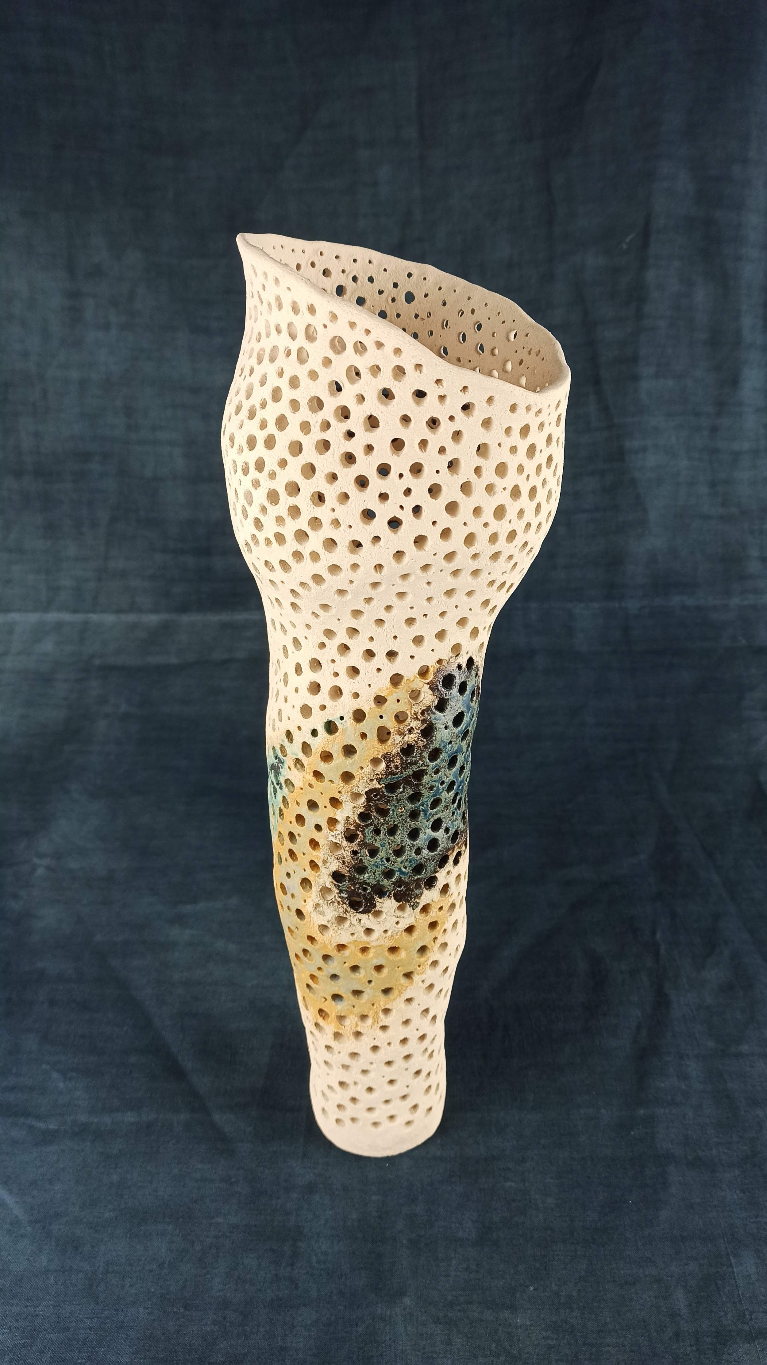 Sponge form with glaze bruising on the side