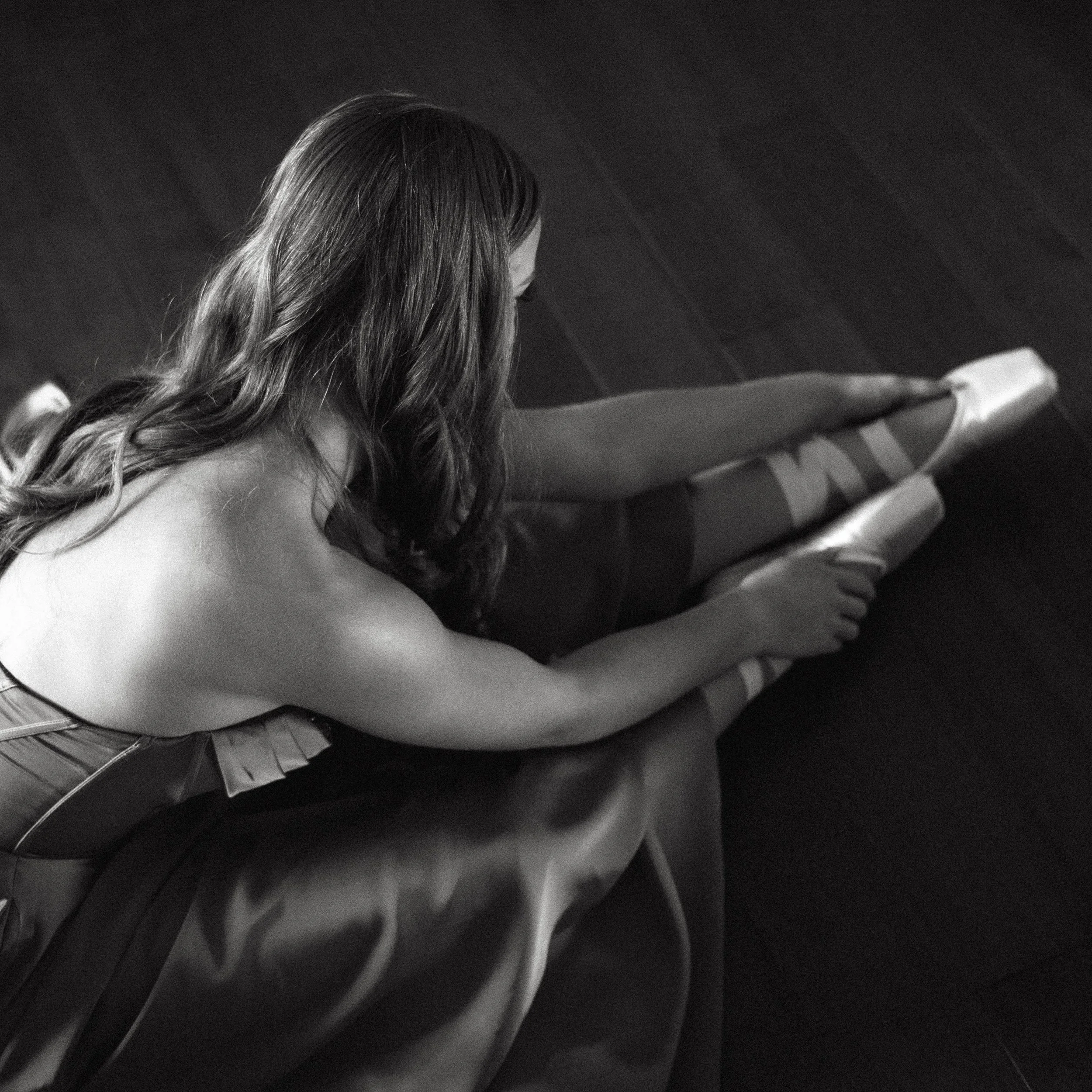 Ribbons wrapped around ankles &mdash; muscle memory, a ritual. Some moments are bigger than the moment. 🖤