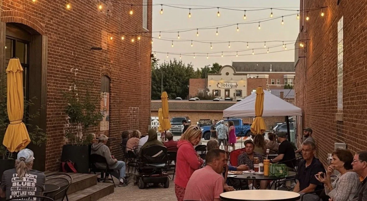 Guests gathering on the outdoor patio at Nicolet Ale Works in De Pere, Wisconsin.