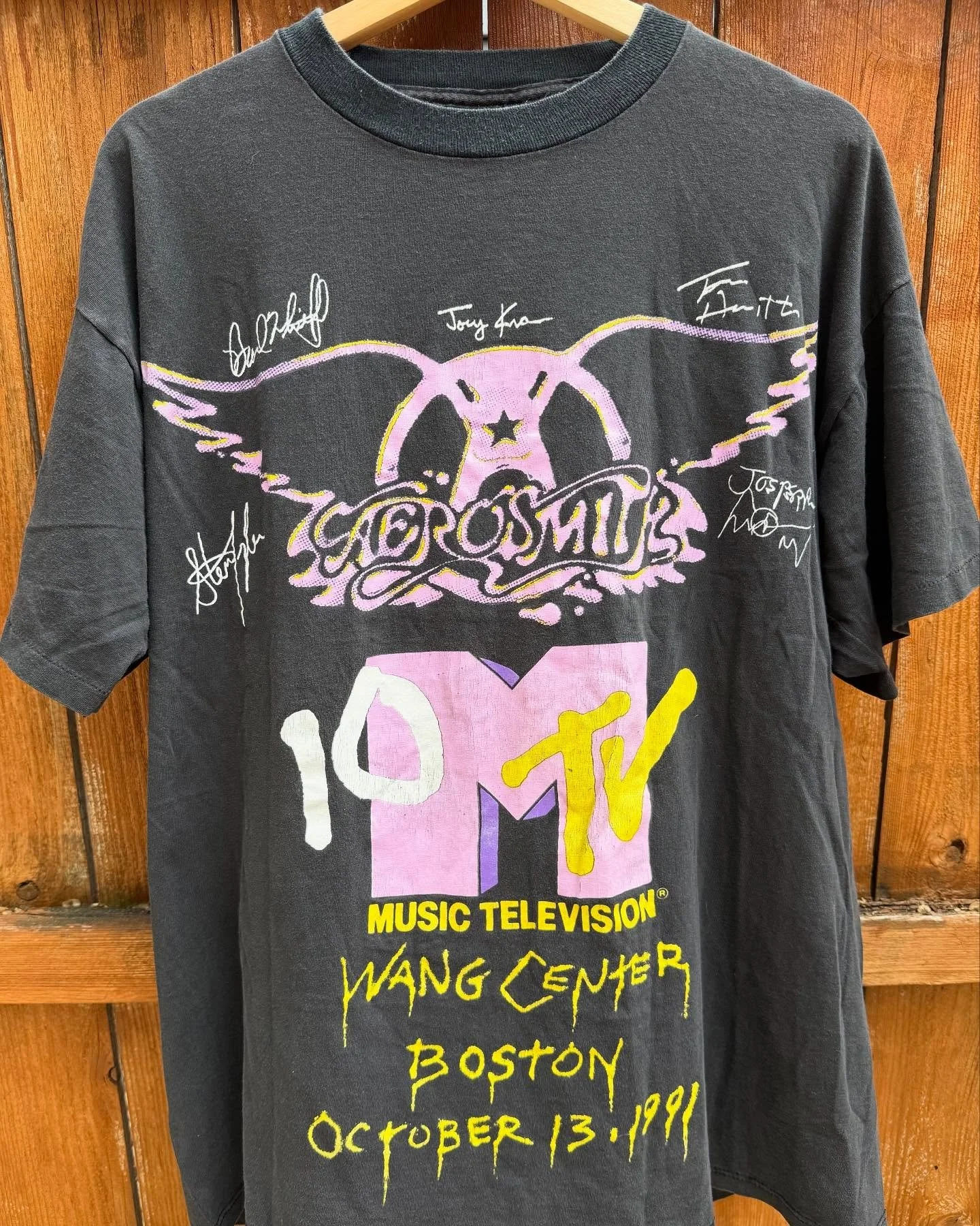 In 1991 Aerosmith recorded an iconic version of their seminal song "Dream On" with the Michael Kamen symphony Orchestra, conducted by Michael Kamen himself. The song was aired as a part of the MTV 10th Anniversary Special which this shirt c