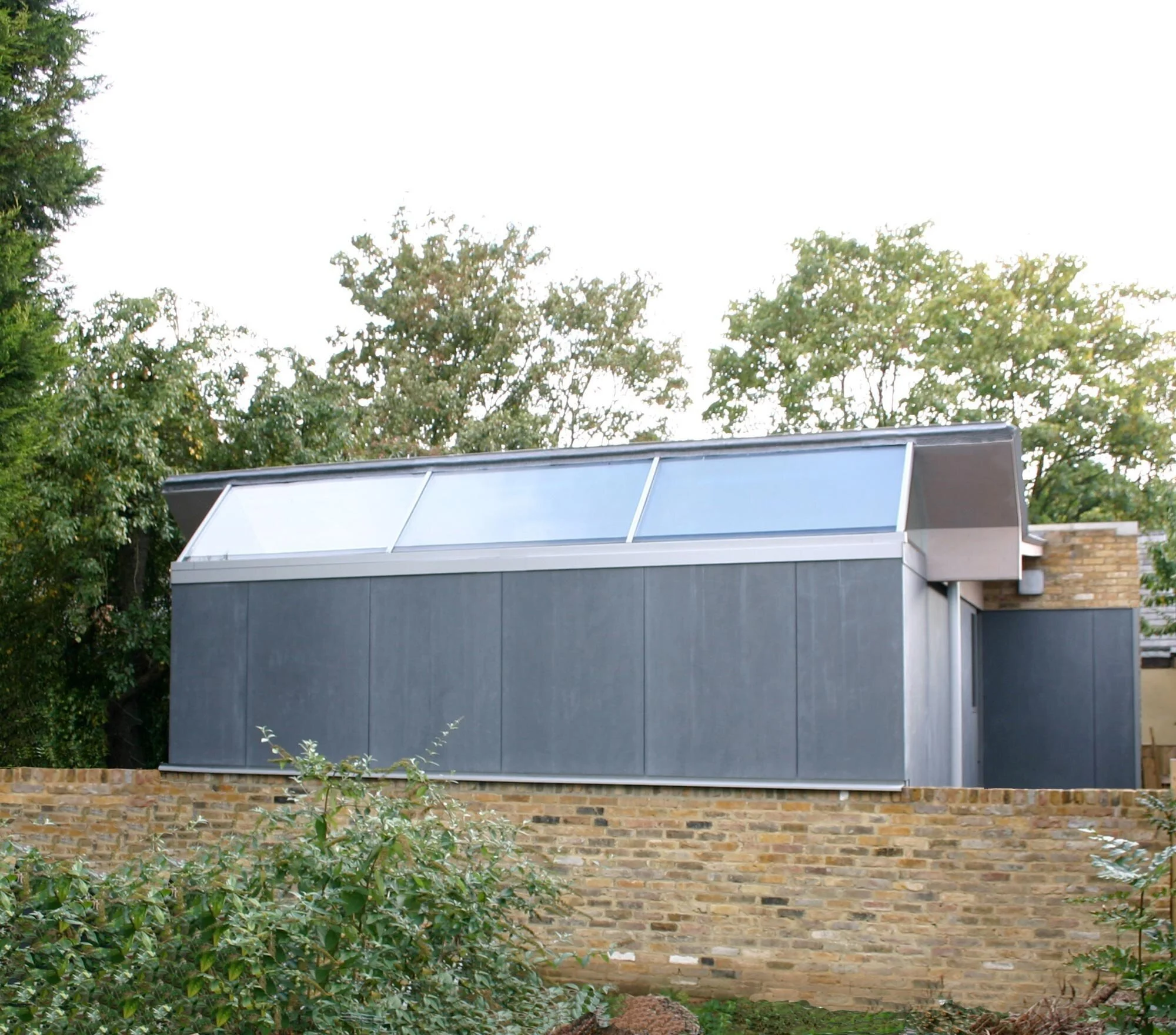 Rozeman Architects — "the whole ensemble is finely judged, delicate but tough, and a triumph considering the limited budget. The colour of the panels is most satisfactory