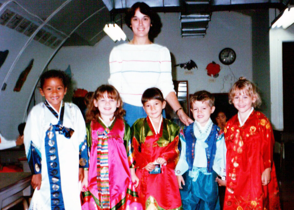 Mary helped at the kindergarten. The Army let them use a quanset hut as a temporary school for the local kids.
