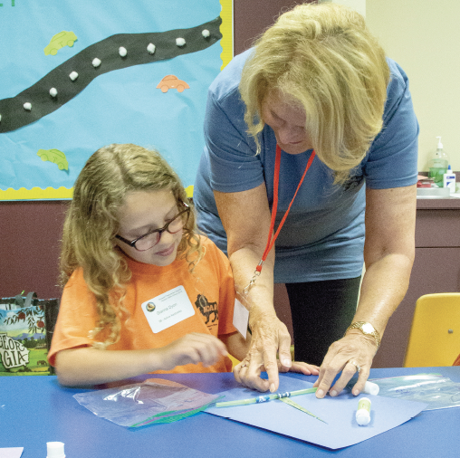 Child and teacher.png