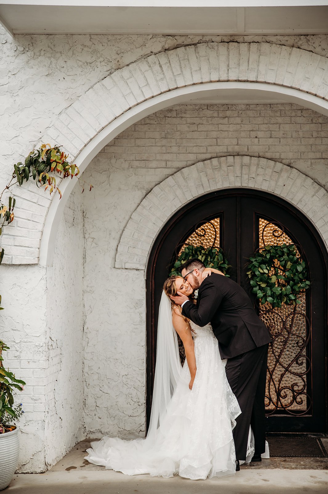 The Woodlands venue shows off its entrance with a couple standing in front of it.