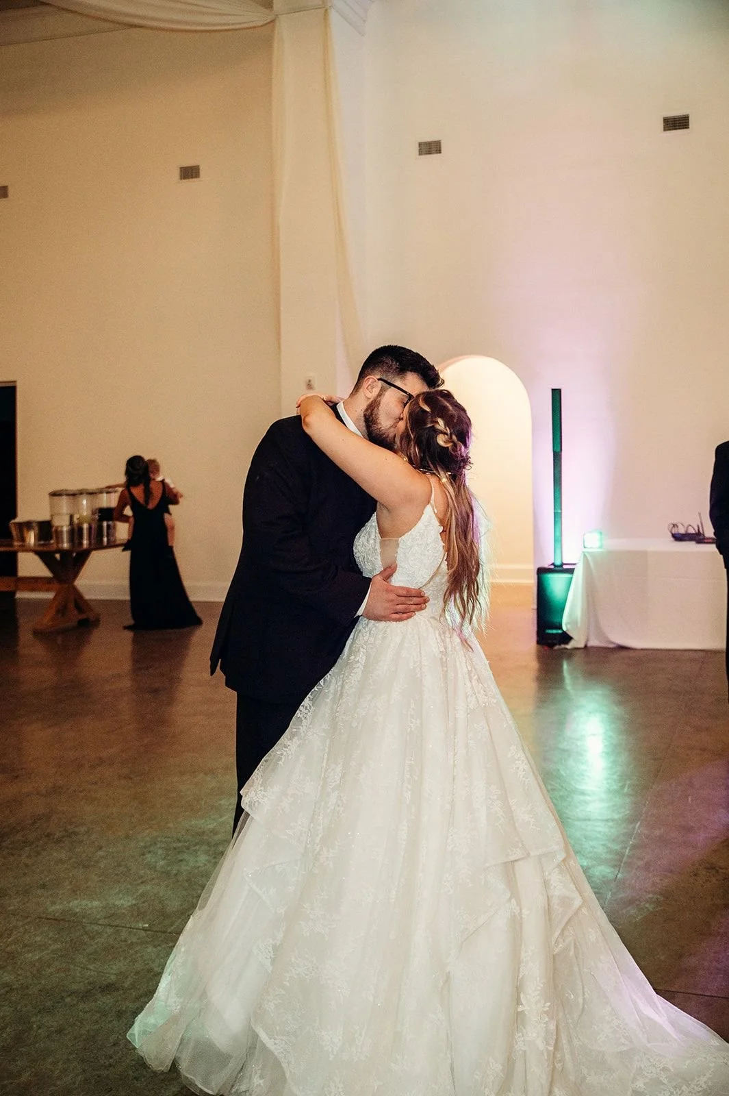 A couple has a private last dance before exiting their wedding.