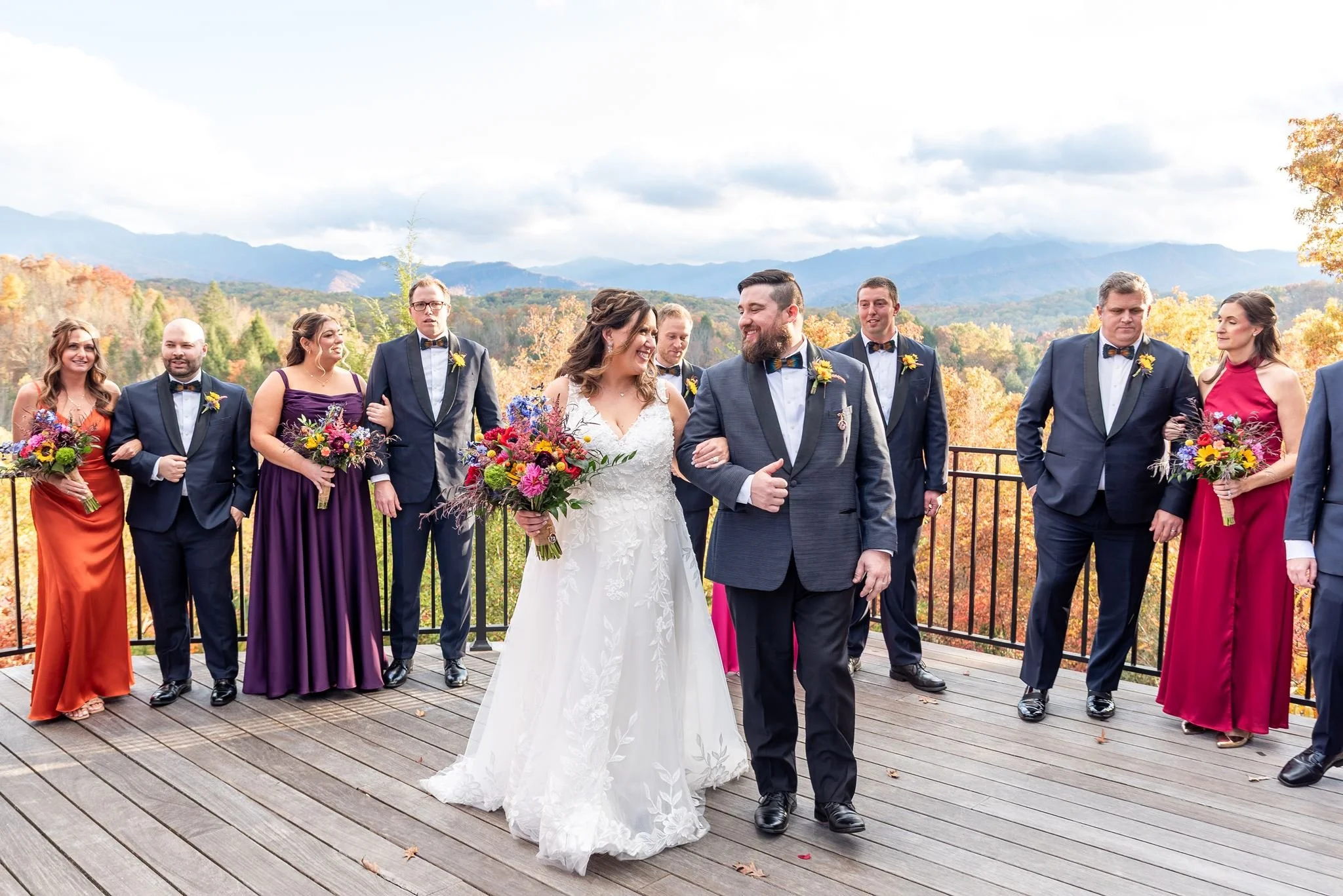 The bridal party hangs out on the porch of Greenbrier Estate.