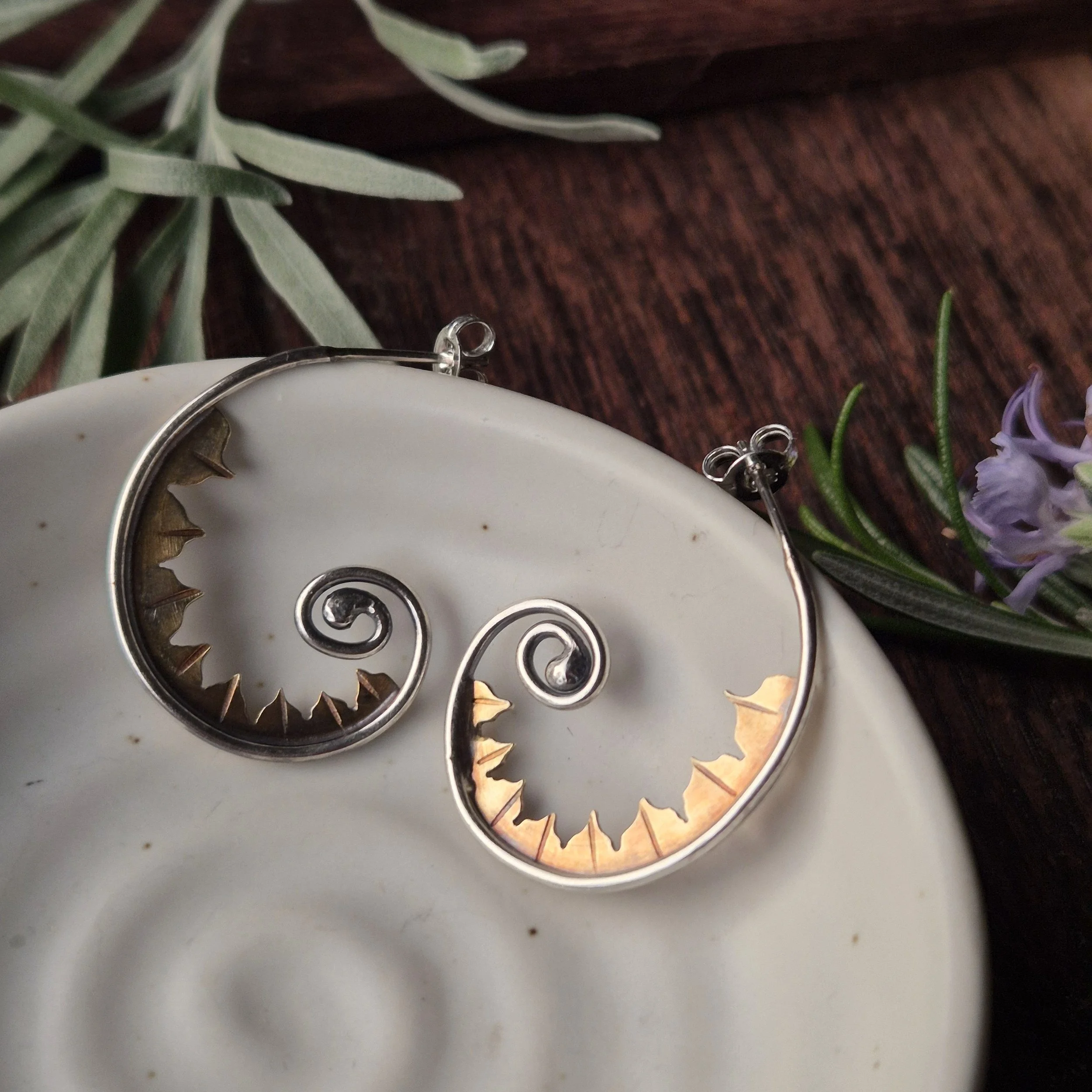 Hammering Hag sq Fiddlehead Hoops.jpg