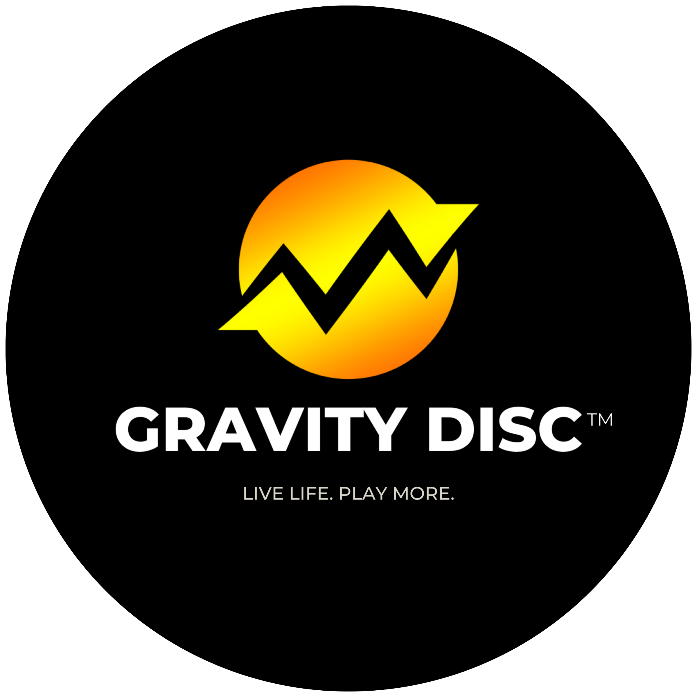 A smiling man with short black hair, a beard, and a mustache, standing outdoors on a city street, wearing a light gray T-shirt.