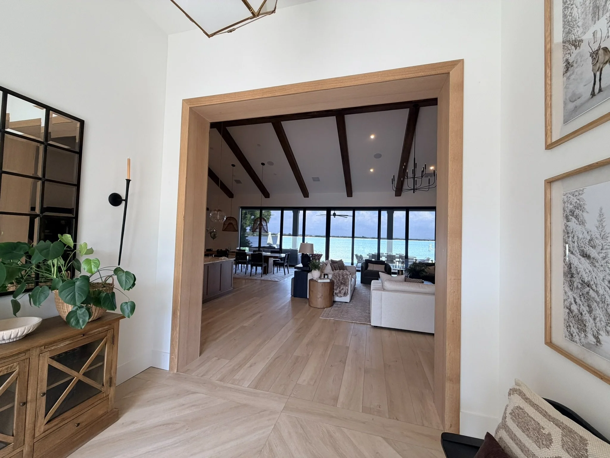 Custom white oak cased opening and luxury interior millwork