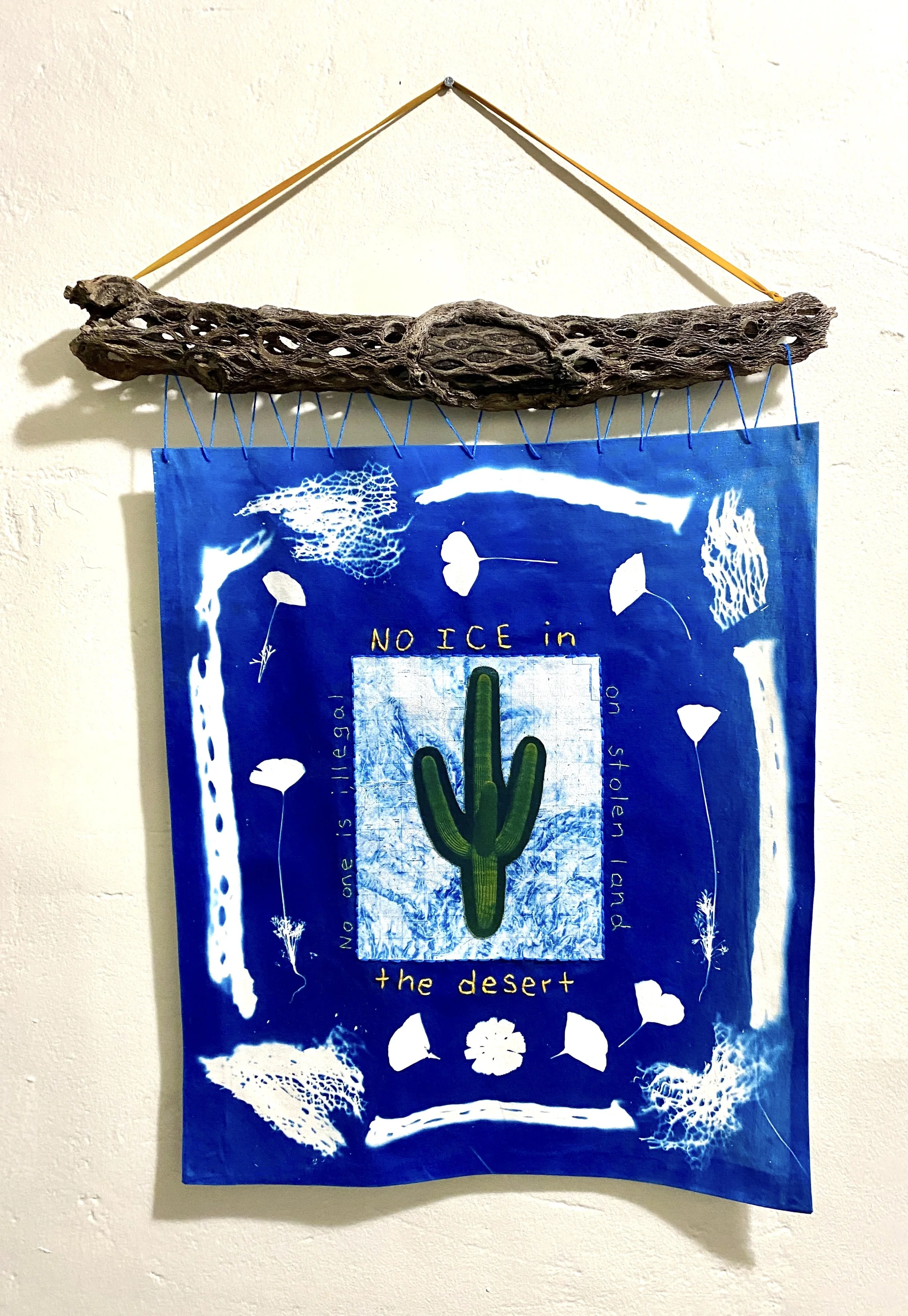 18 people have died in ICE custody from Jan-May 2026 (2026). Cyanotype on cotton with embroidery and cholla skeleton support