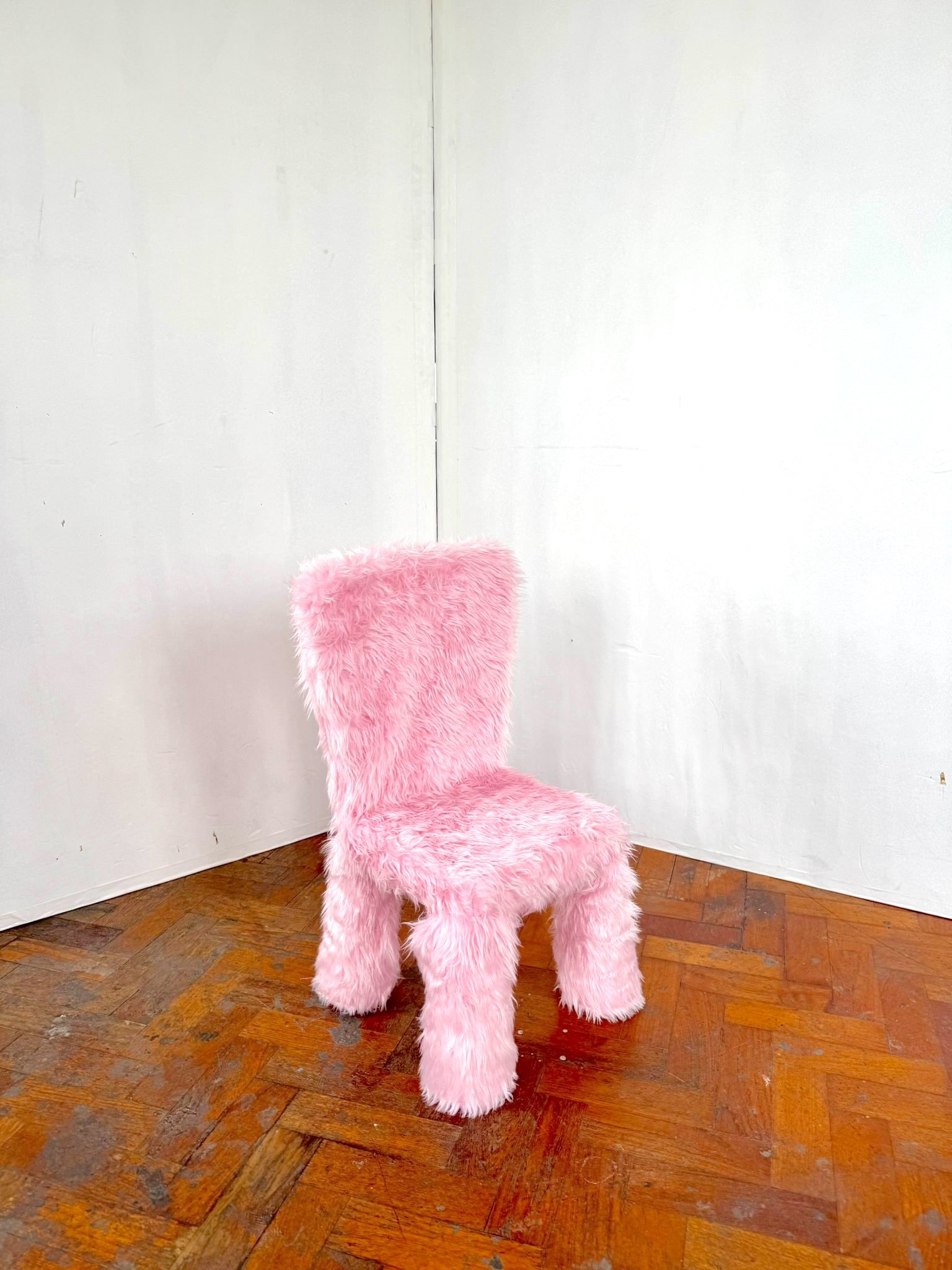 Kid's pink fluffy chair.jpeg