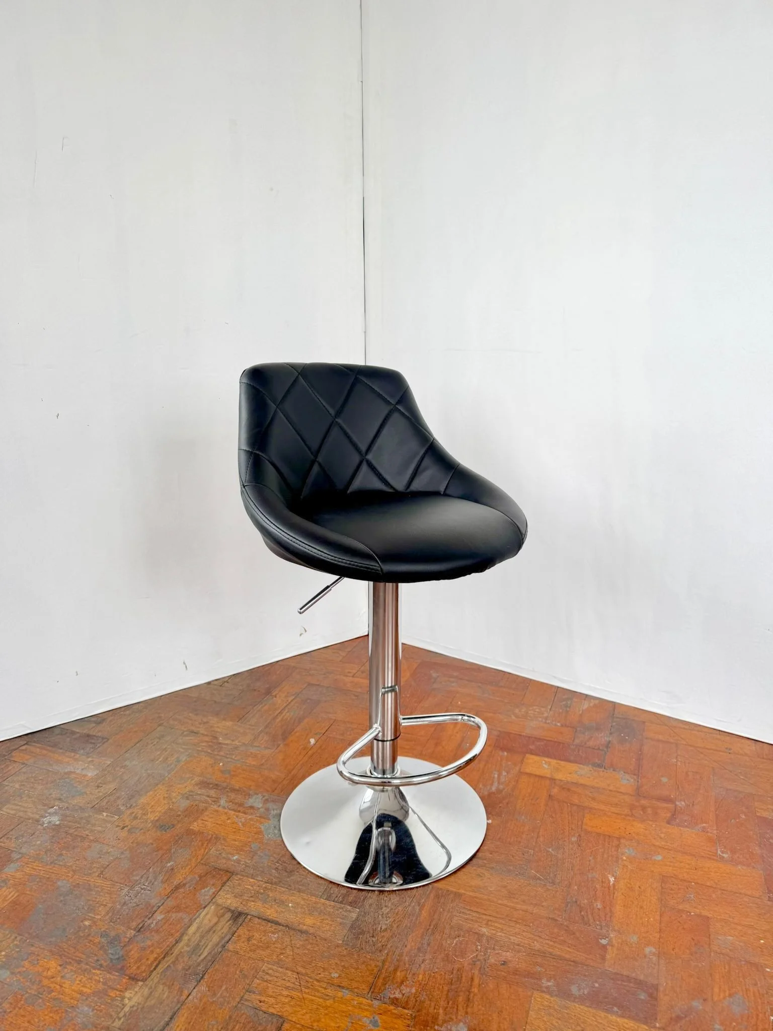 Black leather stool.jpeg