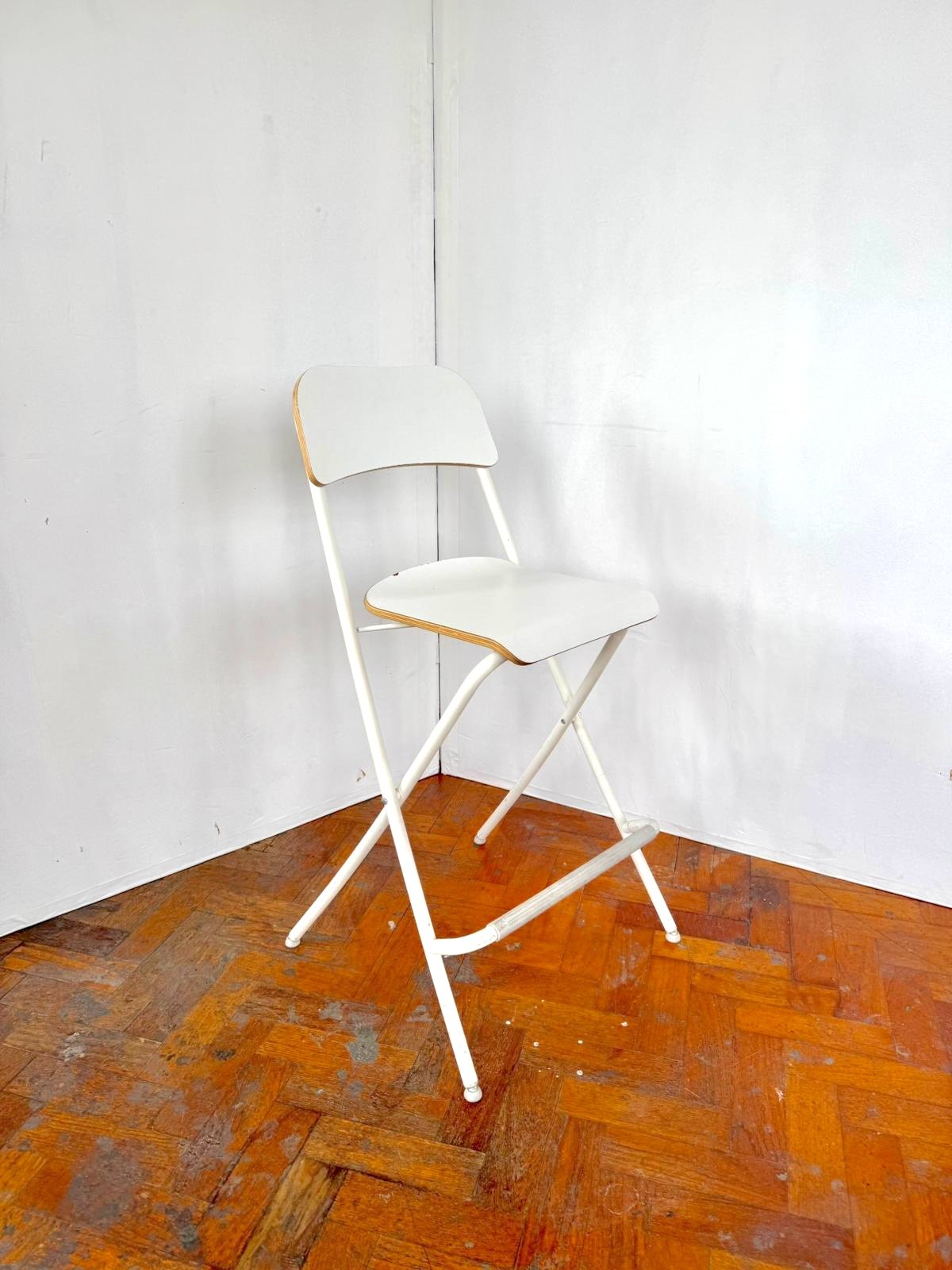 Foldable white stool.jpeg