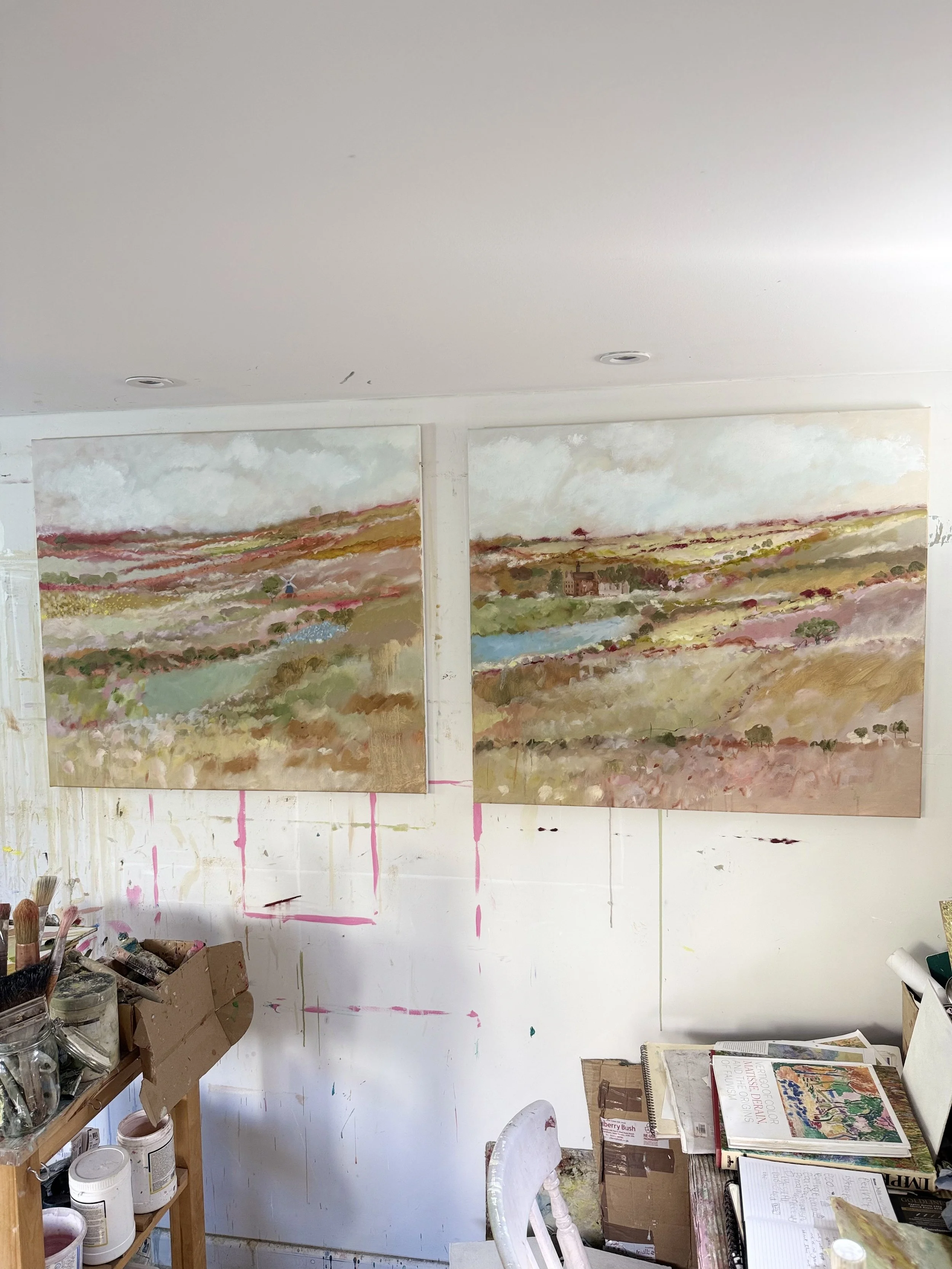 Olivia and jethros paintings in the studio.jpg
